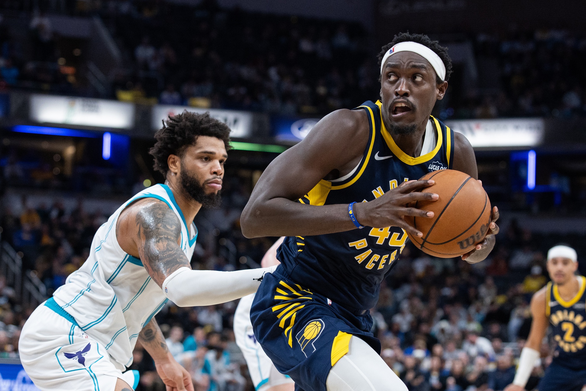 Indiana Pacers forward Pascal Siakam (43) holds the ball while Charlotte Hornets forward Miles Bridges (0) defends in the second half at Gainbridge Fieldhouse.