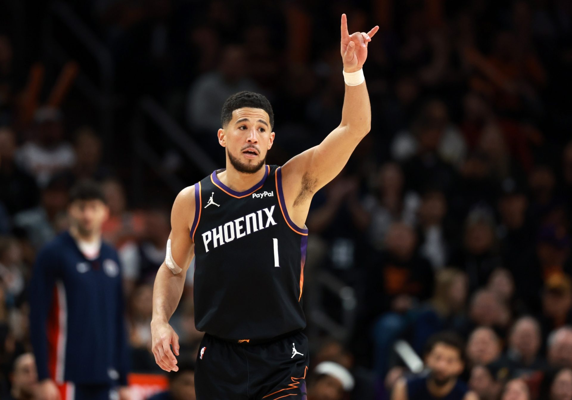 Phoenix Suns guard Devin Booker (1) reacts against the Washington Wizards in the first half at Mortgage Matchup Center.