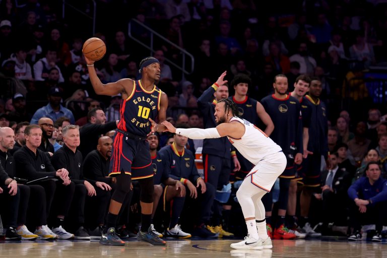 Golden State Warriors forward Jimmy Butler III (10) controls the ball against New York Knicks guard Jalen Brunson (11) during the third quarter at Madison Square Garden.