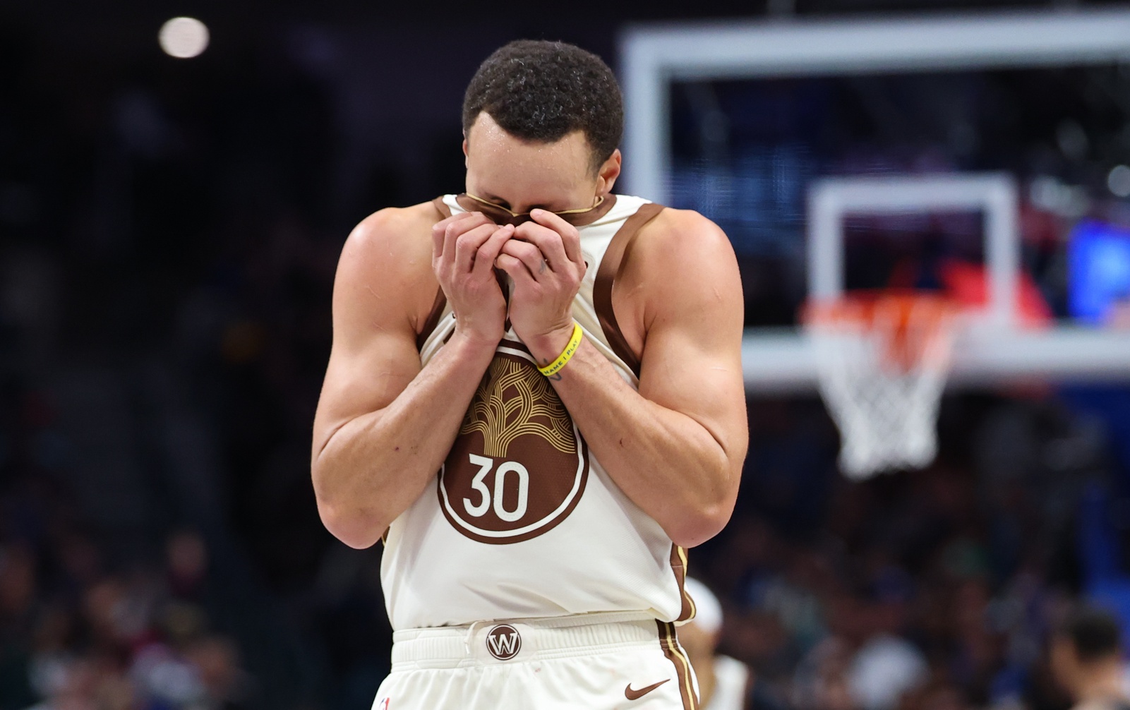 Golden State Warriors guard Stephen Curry (30) reacts against the Dallas Mavericks during the second half at American Airlines Center.