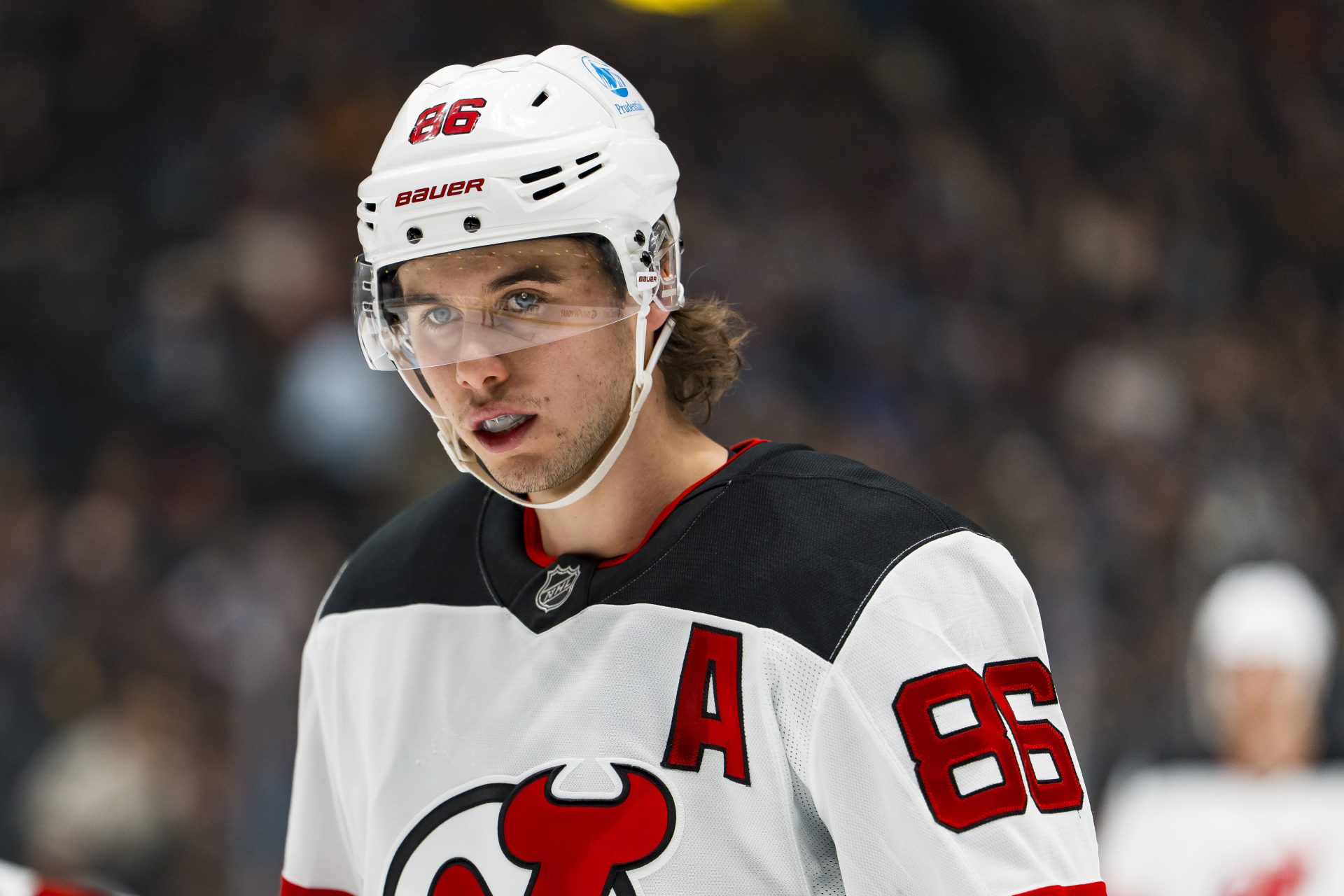 New Jersey Devils forward Jack Hughes (86) looks on during a stop in play against the Vancouver Canucks in the first period at Rogers Arena.