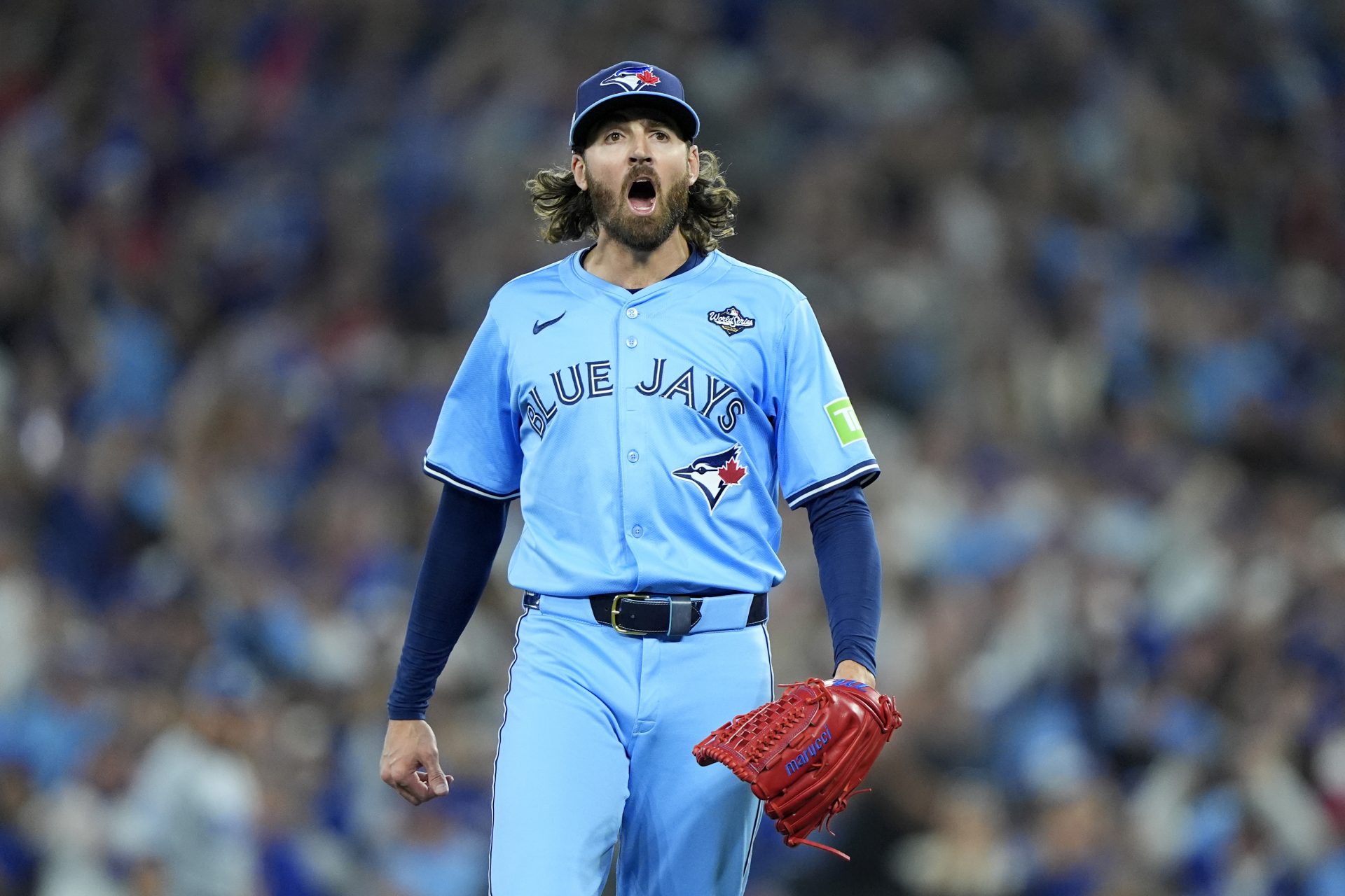 Toronto Blue Jays pitcher Kevin Gausman (34) reacts after striking out Los Angeles Dodgers first baseman Freddie Freeman (5) in the first inning during game six of the 2025 MLB World Series at Rogers Centre.