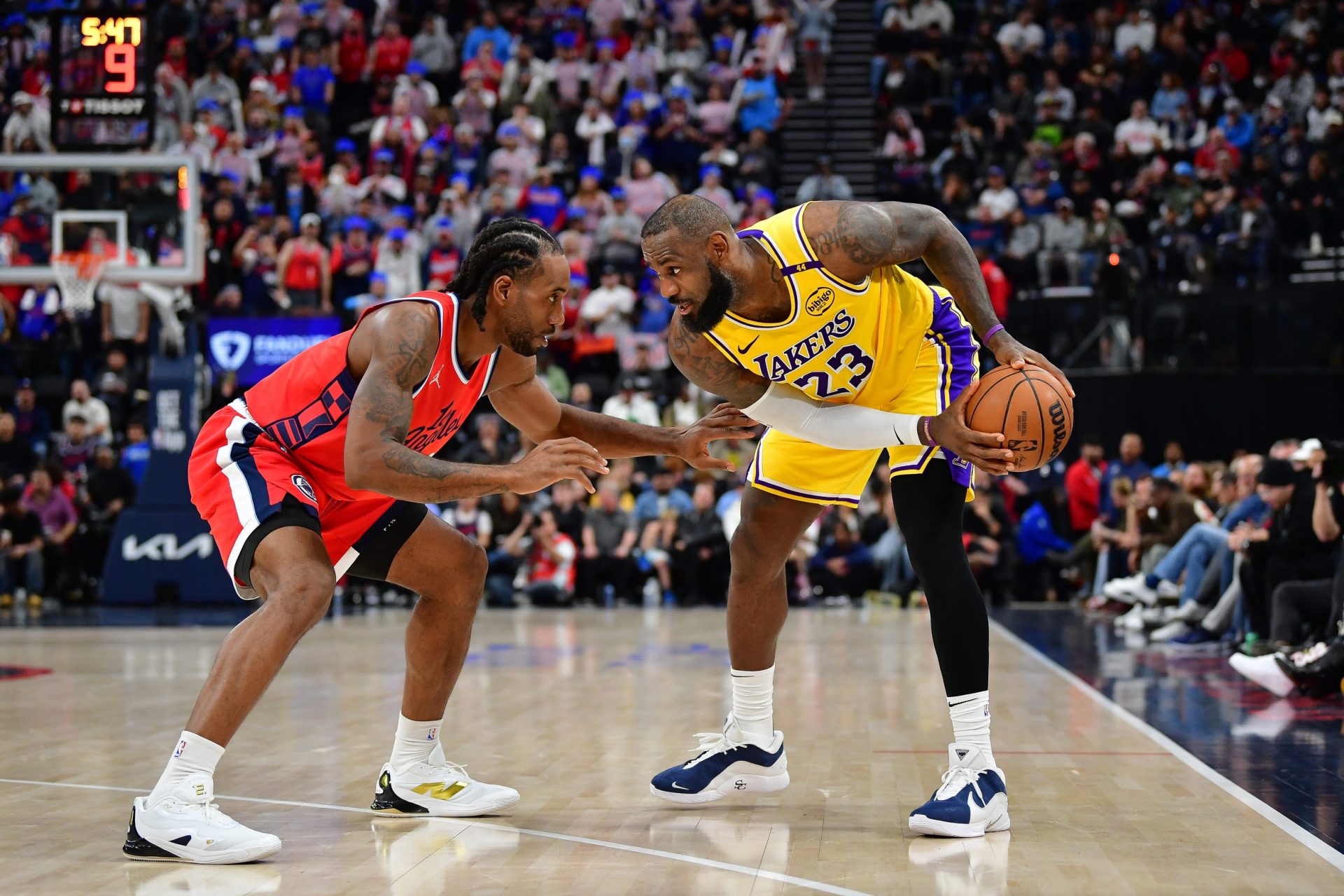 Los Angeles Lakers forward LeBron James (23) controls the ball against Los Angeles Clippers forward Kawhi Leonard (2) during the second half at Intuit Dome.