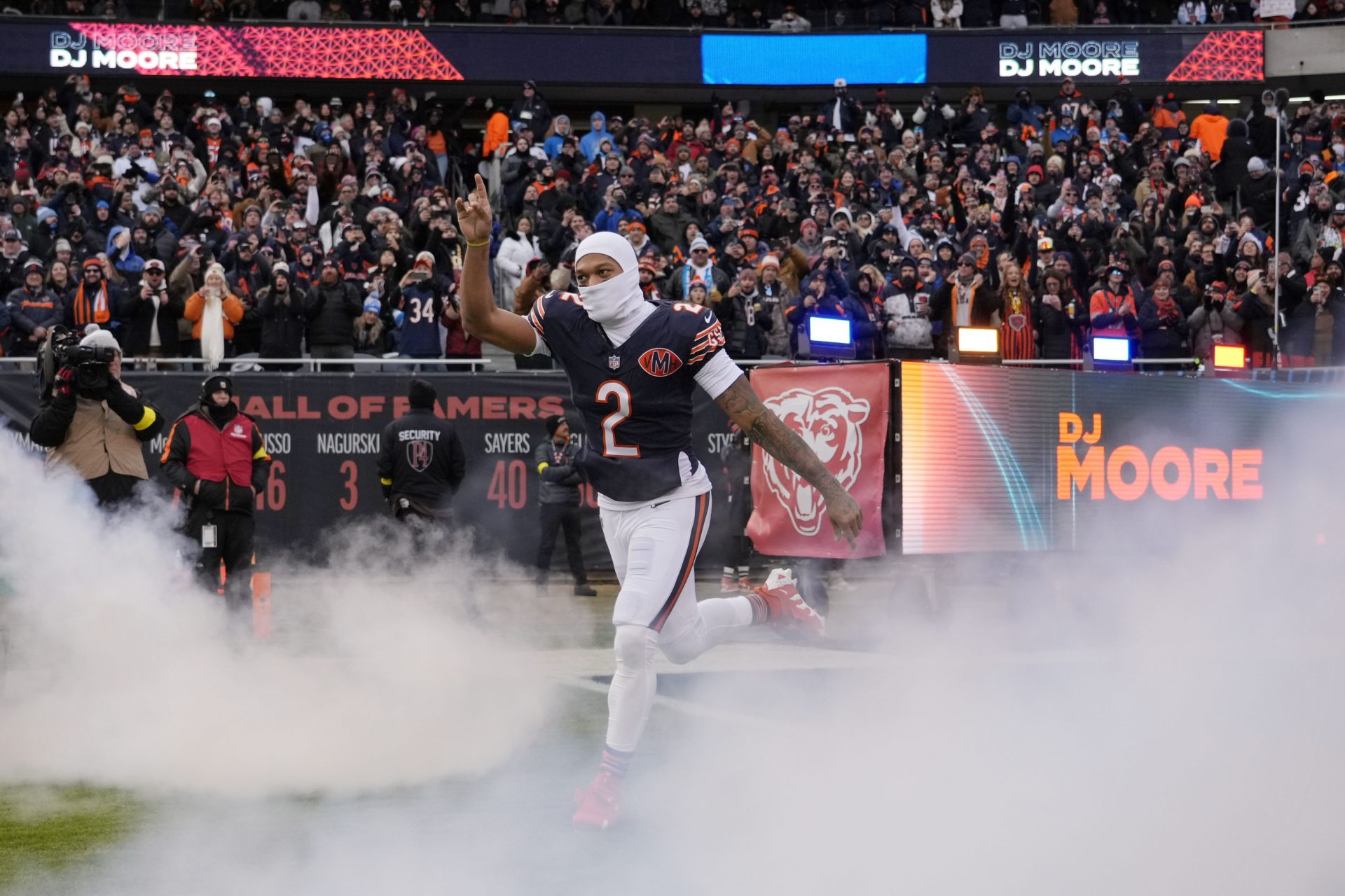 Chicago Bears wide receiver DJ Moore (2) runs onto the field before the game between the Chicago Bears and the Detroit Lions at Soldier Field.