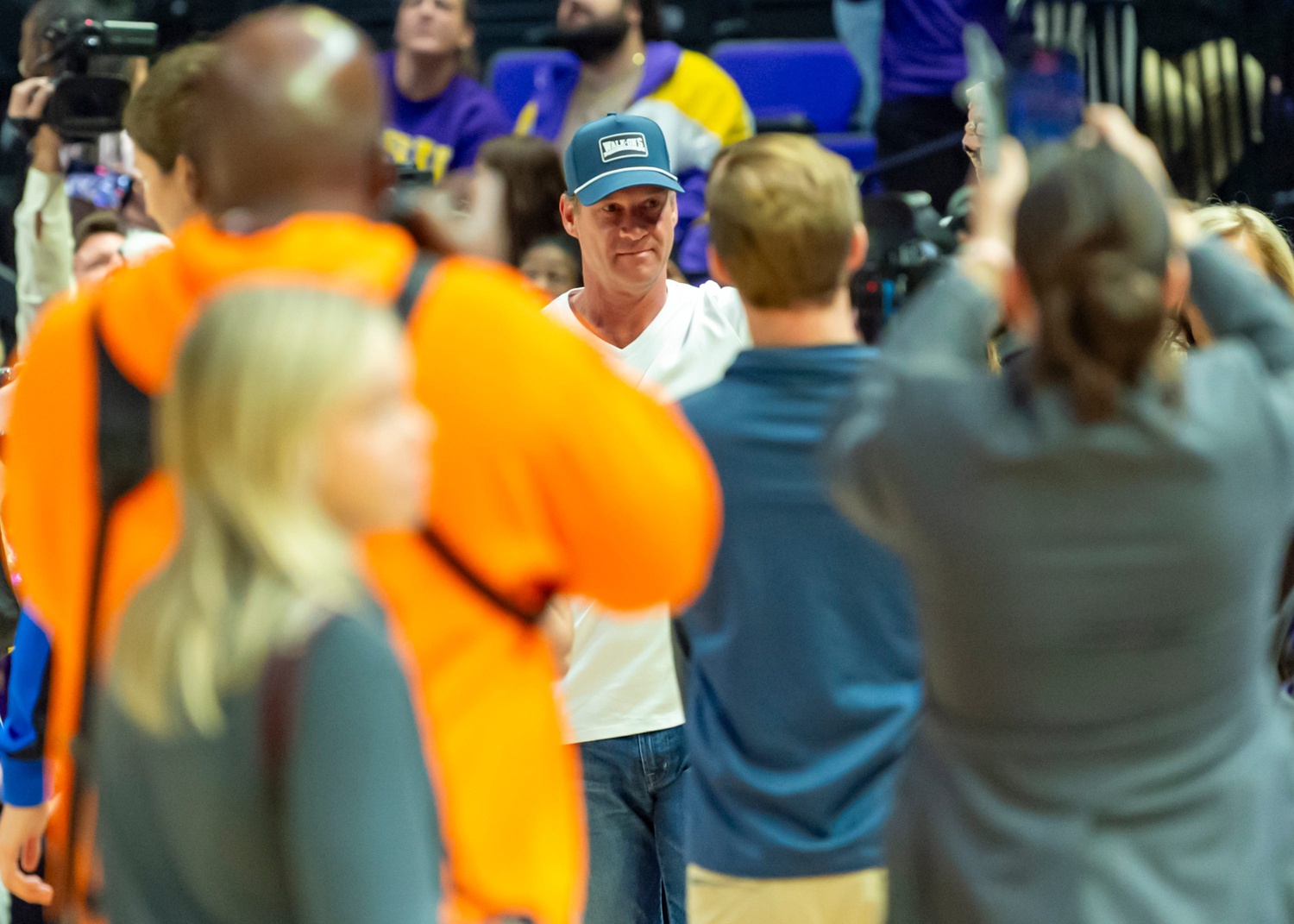 LSU Football Coach Lane Kiffin walks out with Tigers Basketball Coach Kim Mulkey, LSU Tigers Womens Basketball takes on the Kentucky Wildcats. Thursday, Jan. 1, 2026.