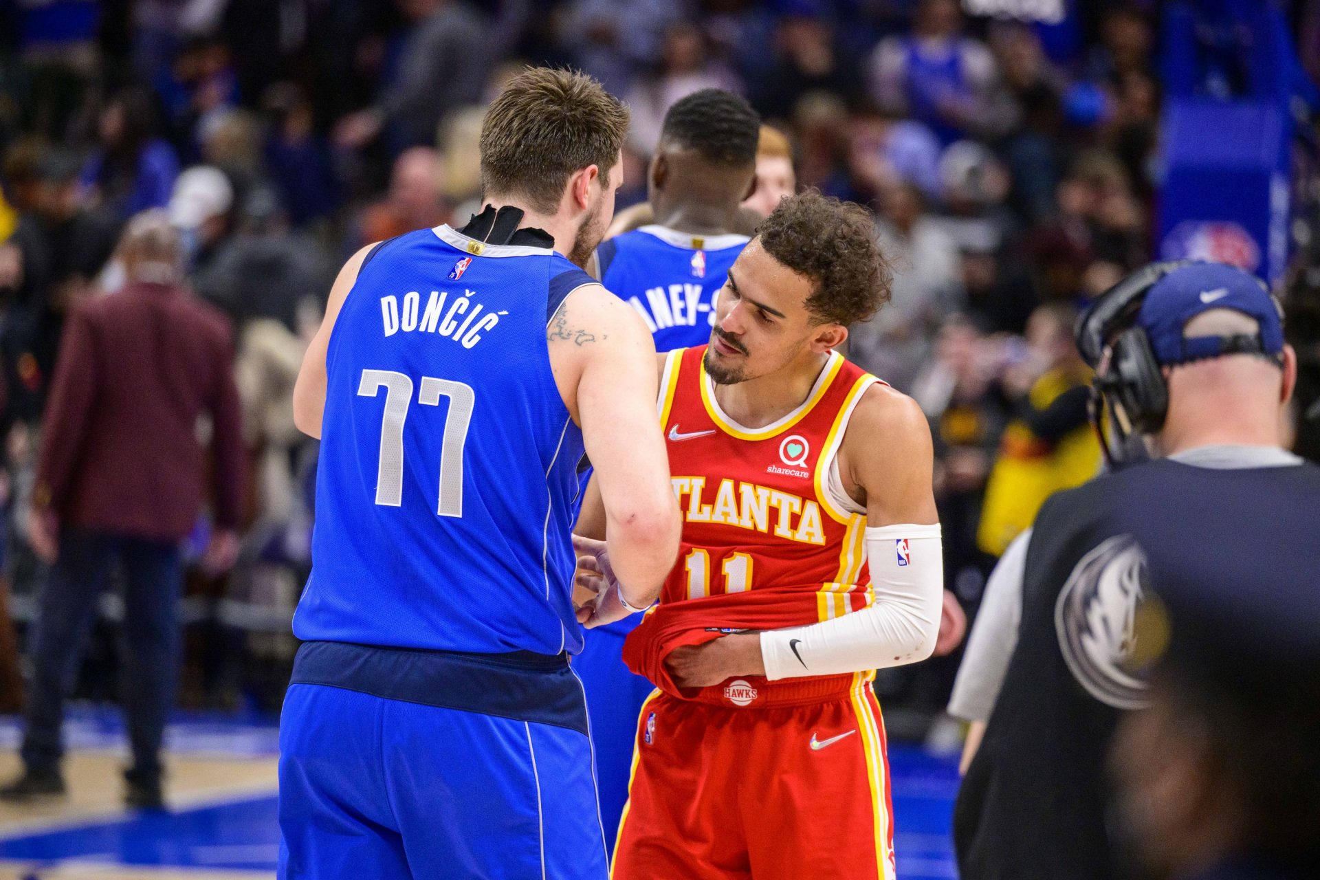 Dallas Mavericks guard Luka Doncic (77) shakes hands with Atlanta Hawks guard Trae Young (11) after the game at the American Airlines Center.