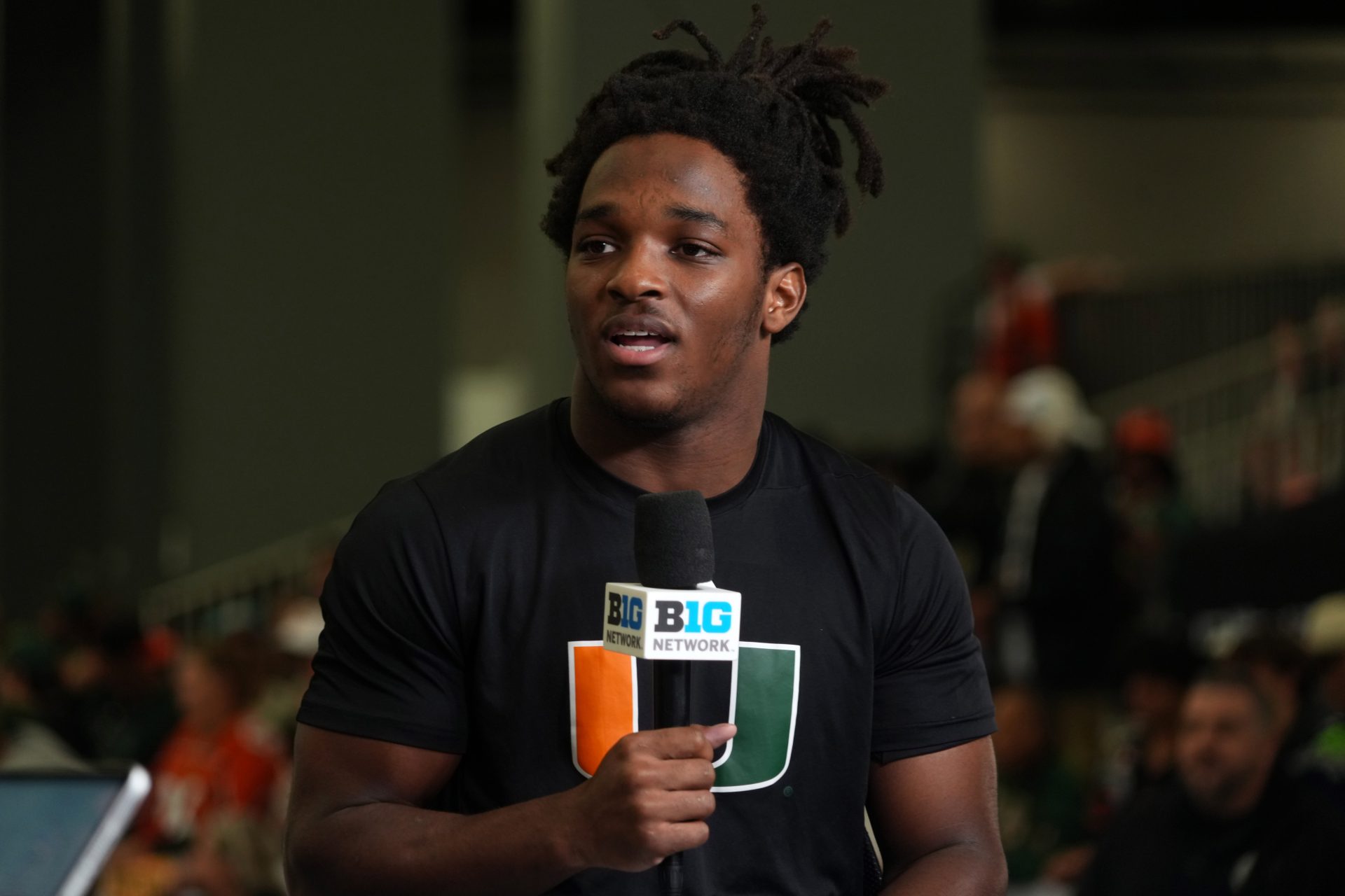 Miami Hurricanes receiver Malachi Toney on the Big Ten Network stage during media day for the 2025 College Football Playoff National Championship at Miami Beach Convention Center.