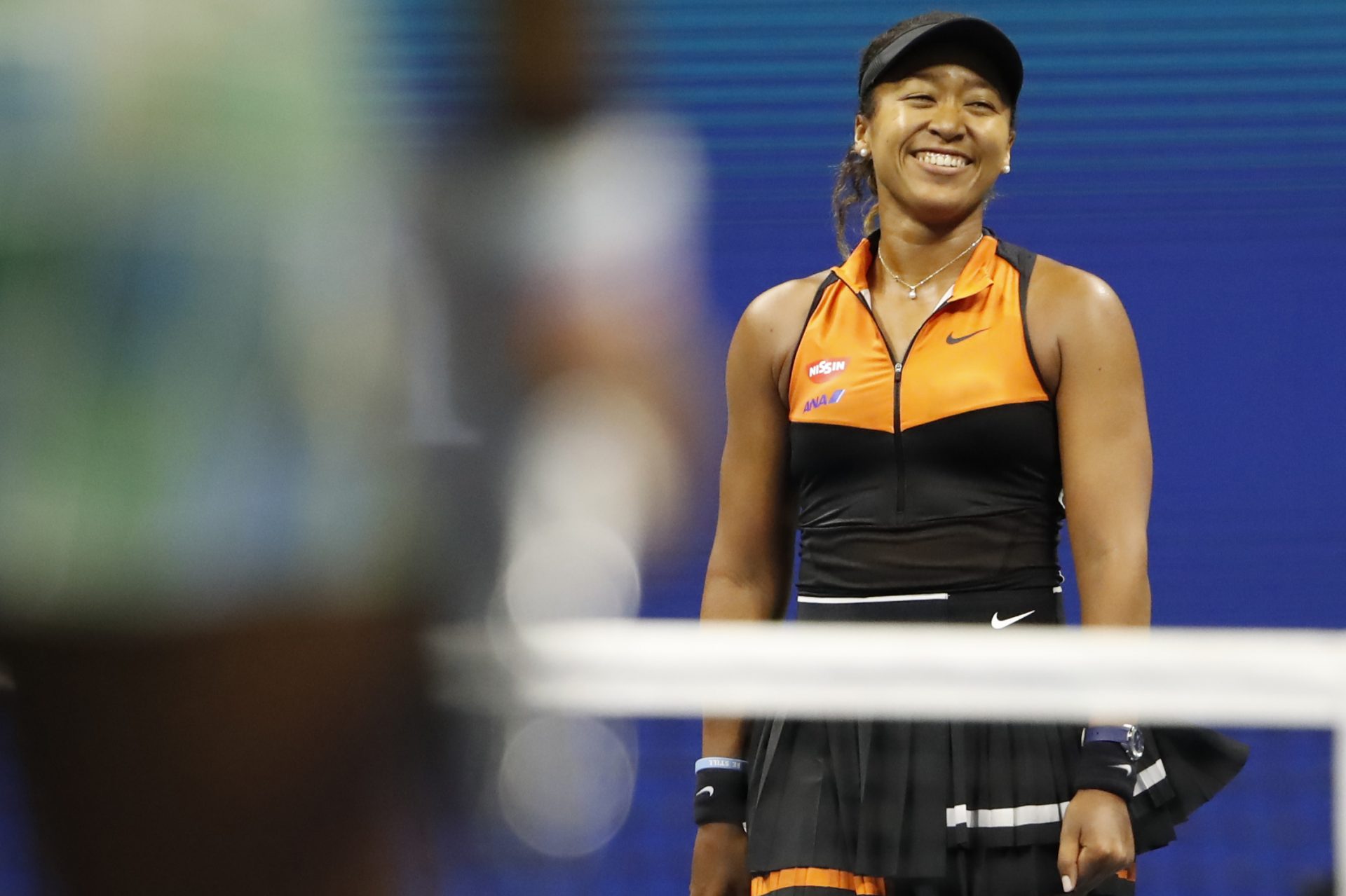 Naomi Osaka of Japan (R) reacts after match point against Coco Gauff of the United States (L) in the third round on day six of the 2019 U.S. Open tennis tournament at USTA Billie Jean King National Tennis Center.