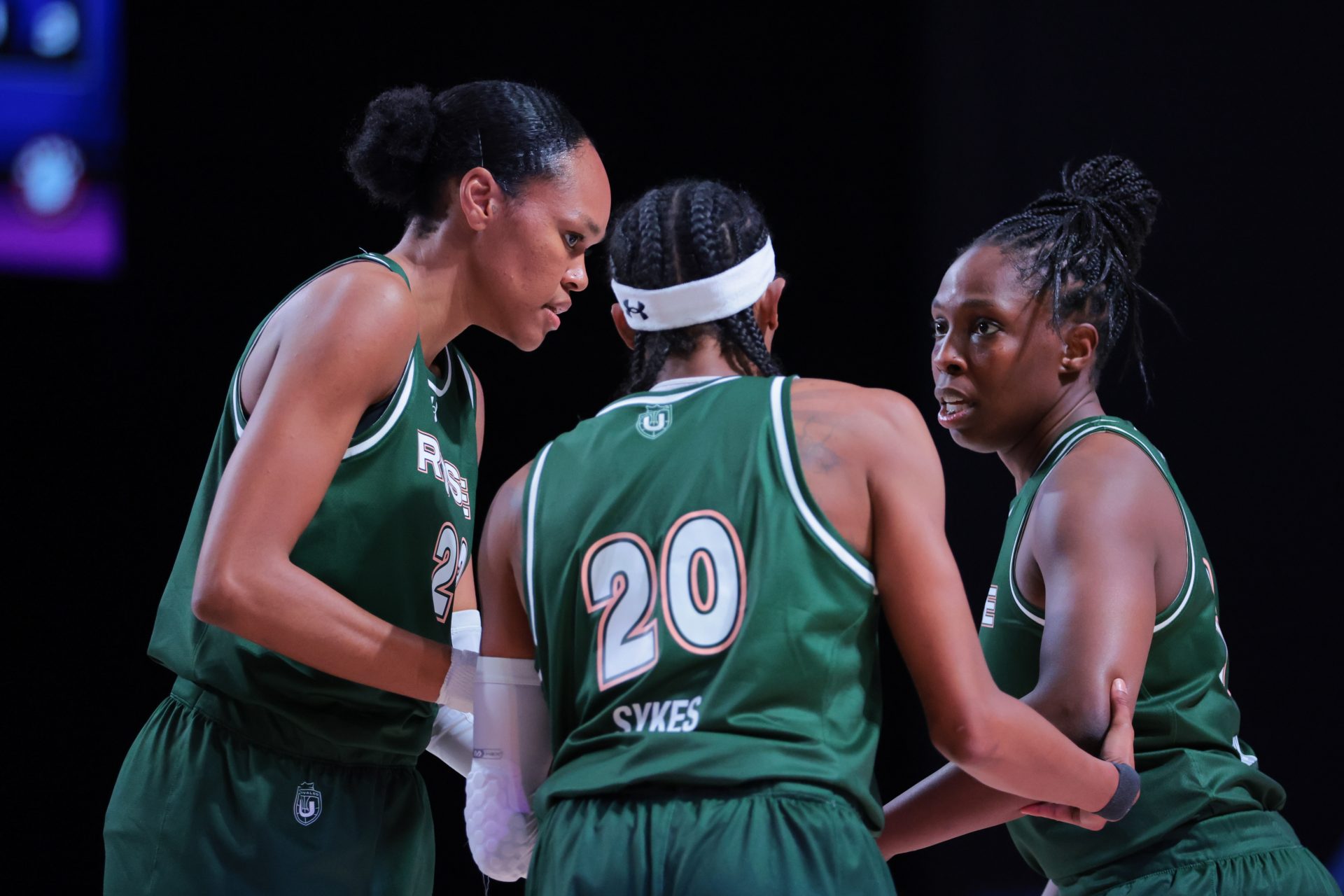 Rose BC guard Brittney Sykes (20) talks to forward Azura Stevens (23) and guard Chelsea Gray (12) against the Vinyl BC during the third period of the Unrivaled Championship game at Wayfair Arena.