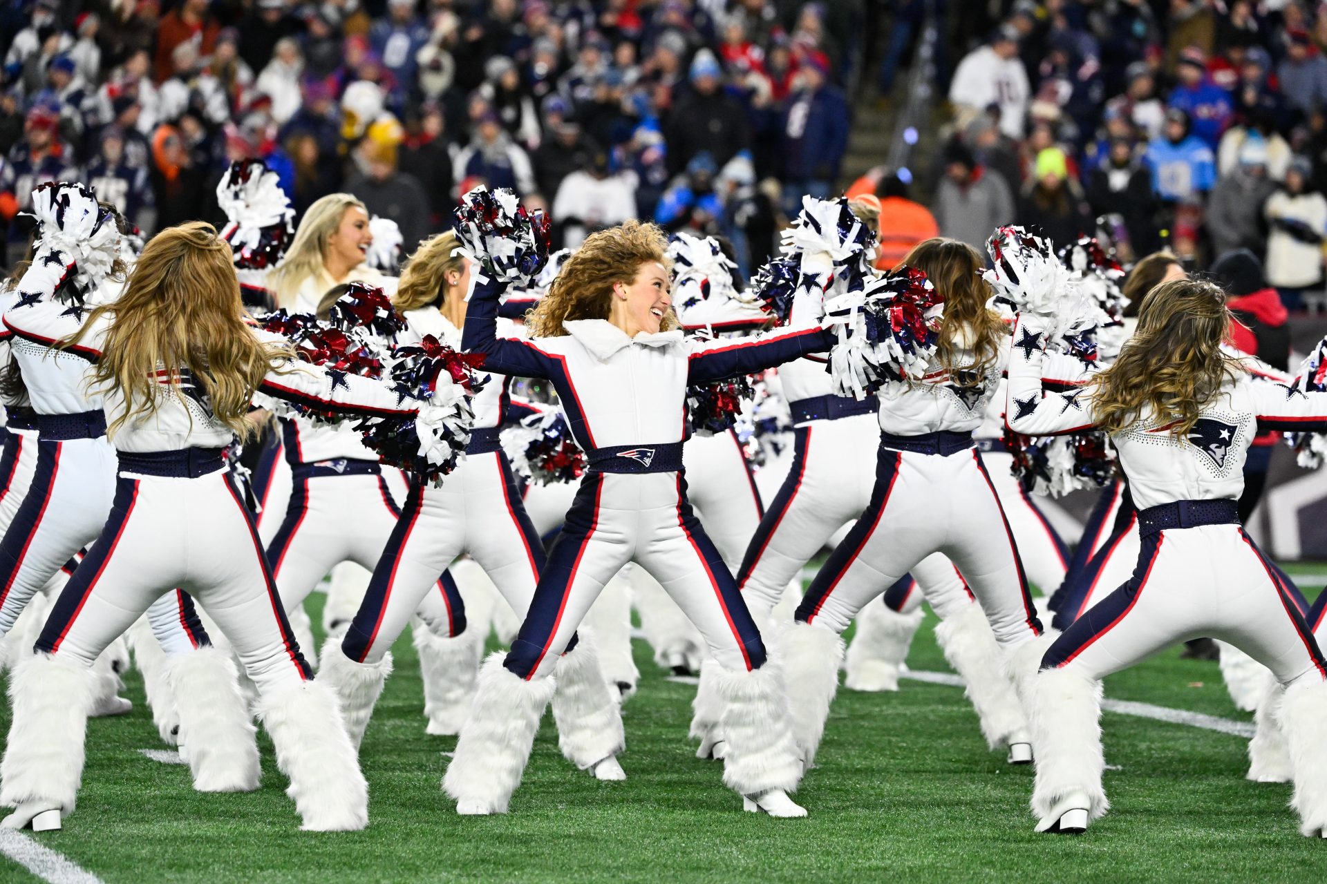 New England Patriots cheerleaders perform during the second quarter against the Los Angeles Chargers in an AFC Wild Card Round game at Gillette Stadium.