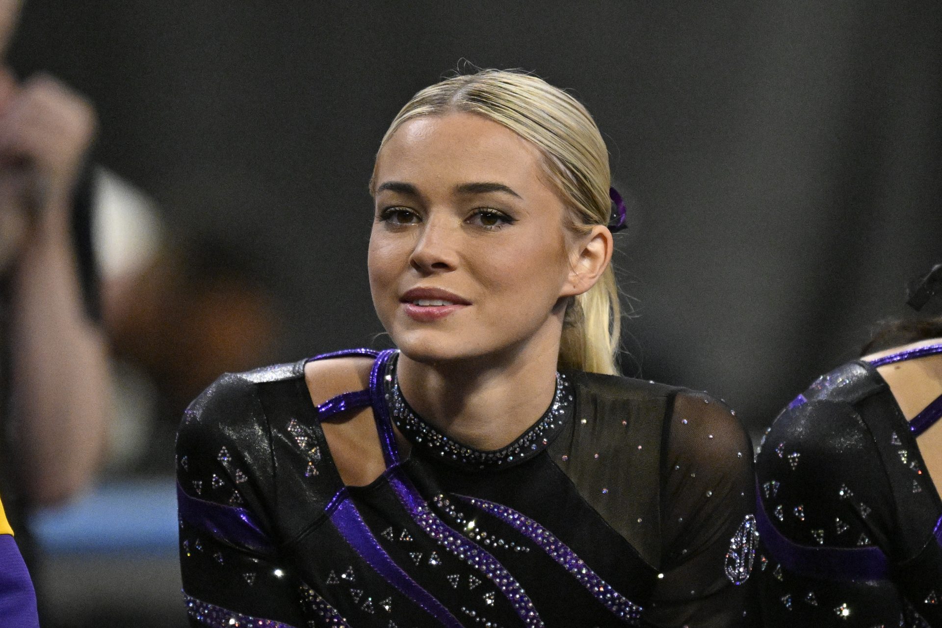 LSU Tigers gymnast Olivia Dunne cheers for the LSU gymnastic team during the 2025 Women's National Gymnastics Semifinal at Dickies Arena.