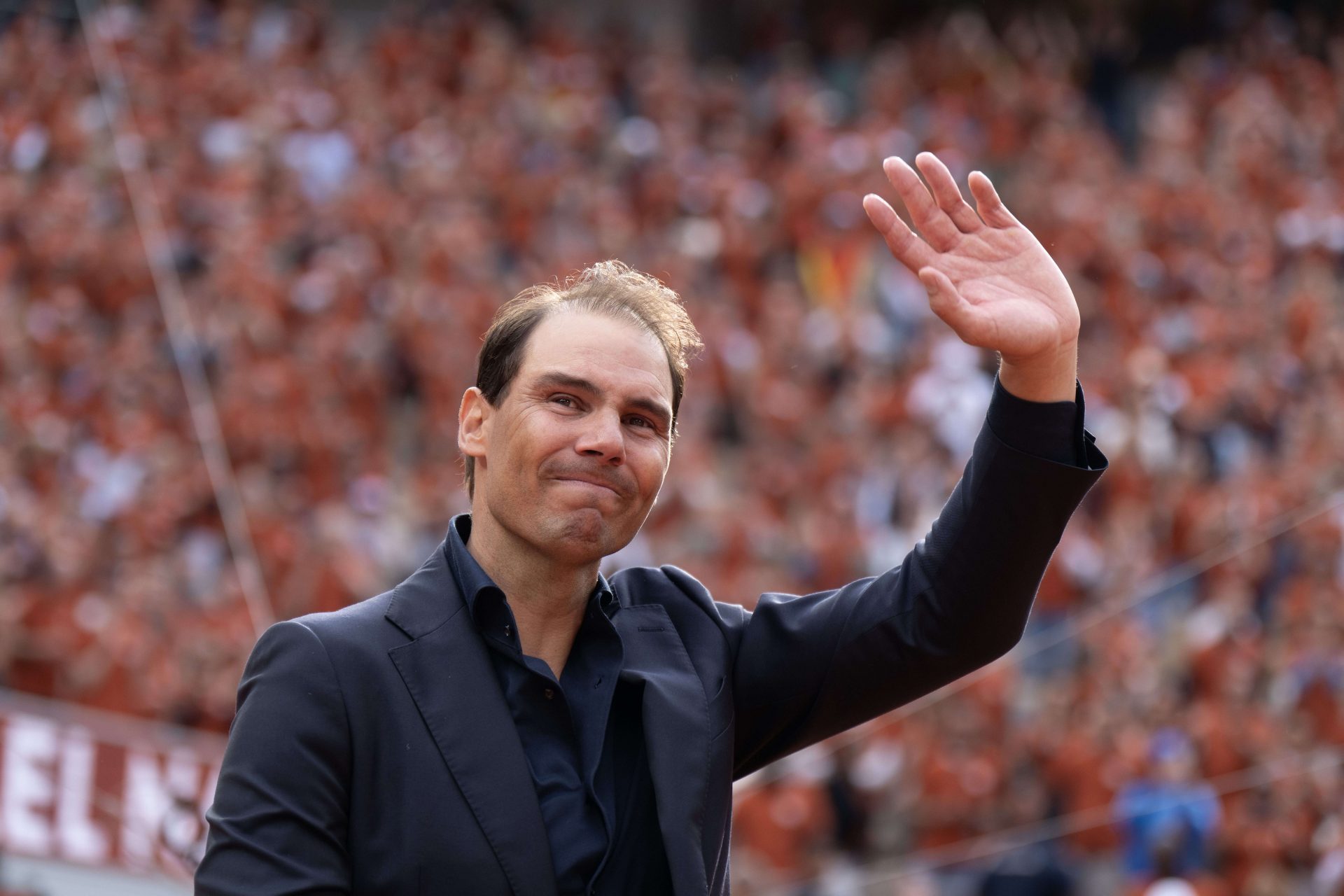 Rafael Nadal of Spain does a final walk around the court during the presentation ceremony paying tribute to his career on a packed Court Philippe Chatrier Courtday on day one at Roland Garros Stadium.