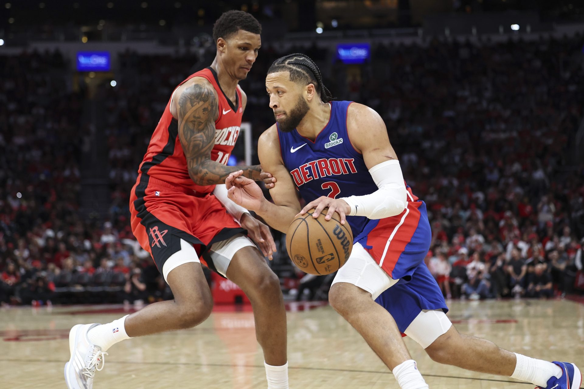 Detroit Pistons guard Cade Cunningham (2) drives with the ball as Houston Rockets forward Jabari Smith Jr. (10) defends during the fourth quarter at Toyota Center.