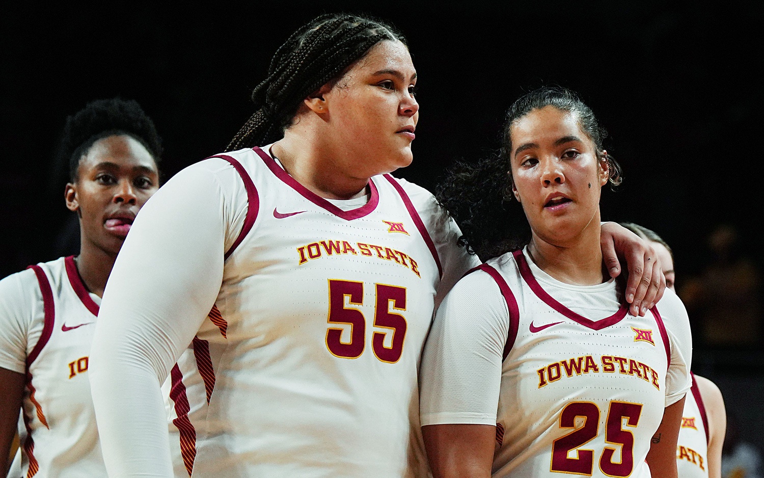 Iowa State Cyclones' center Audi Crooks (55) and West Virginia Mountaineers guard Loghan Johnson (25) react after loosing 70-83 against West Virginia in the Big-12 women’s basketball on Jan. 11, 2026, at Hilton Coliseum in Ames, Iowa.