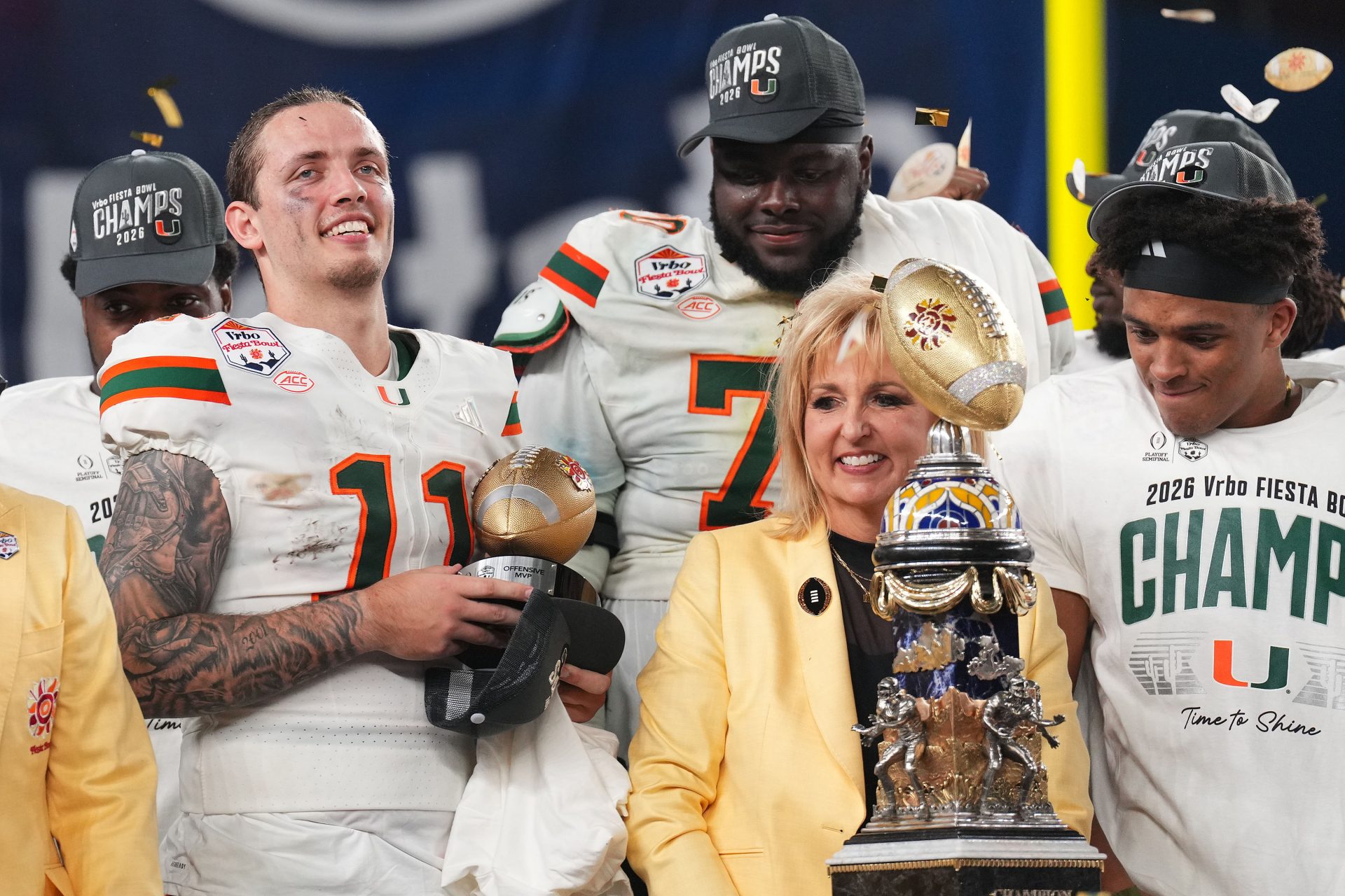 Miami Hurricanes quarterback Carson Beck (11) reacts after winning the 2026 Fiesta Bowl and semifinal game of the College Football Playoff at State Farm Stadium.