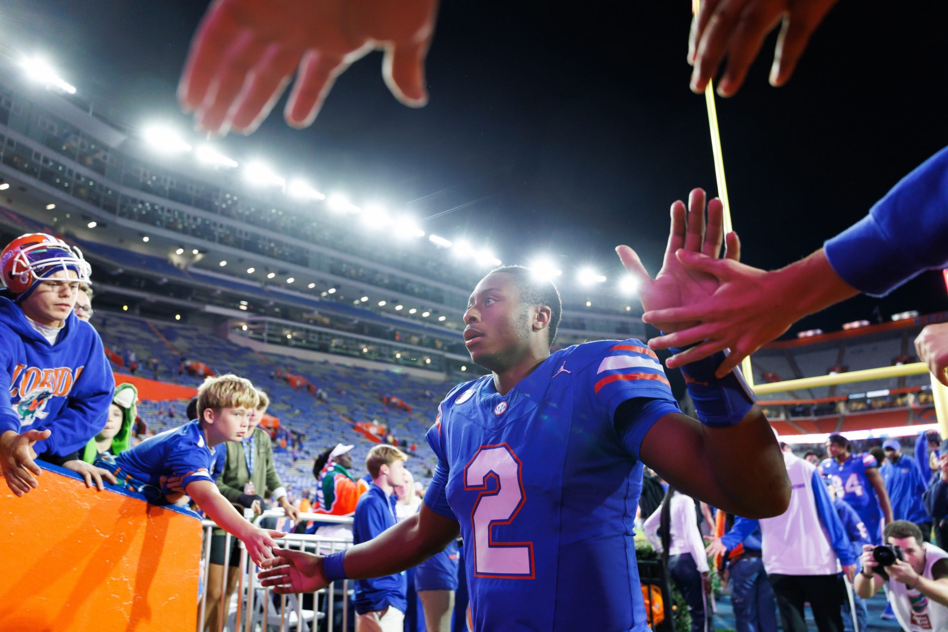 Florida Gators quarterback DJ Lagway (2) leaves the field after a game against the Florida State Seminoles at Ben Hill Griffin Stadium.