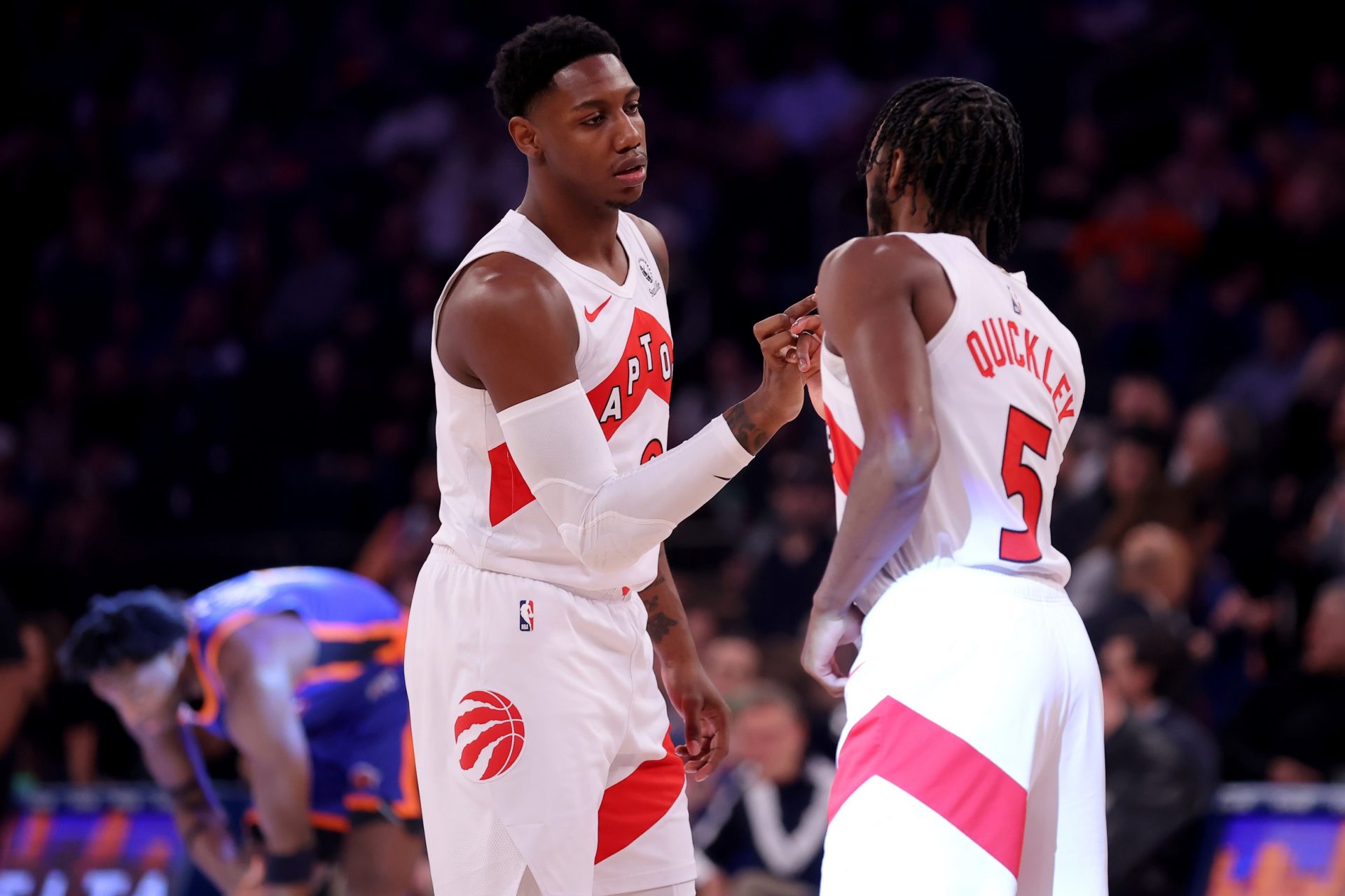 Toronto Raptors guard RJ Barrett (9) and guard Immanuel Quickley (5) shake hands before a game against the New York Knicks at Madison Square Garden.