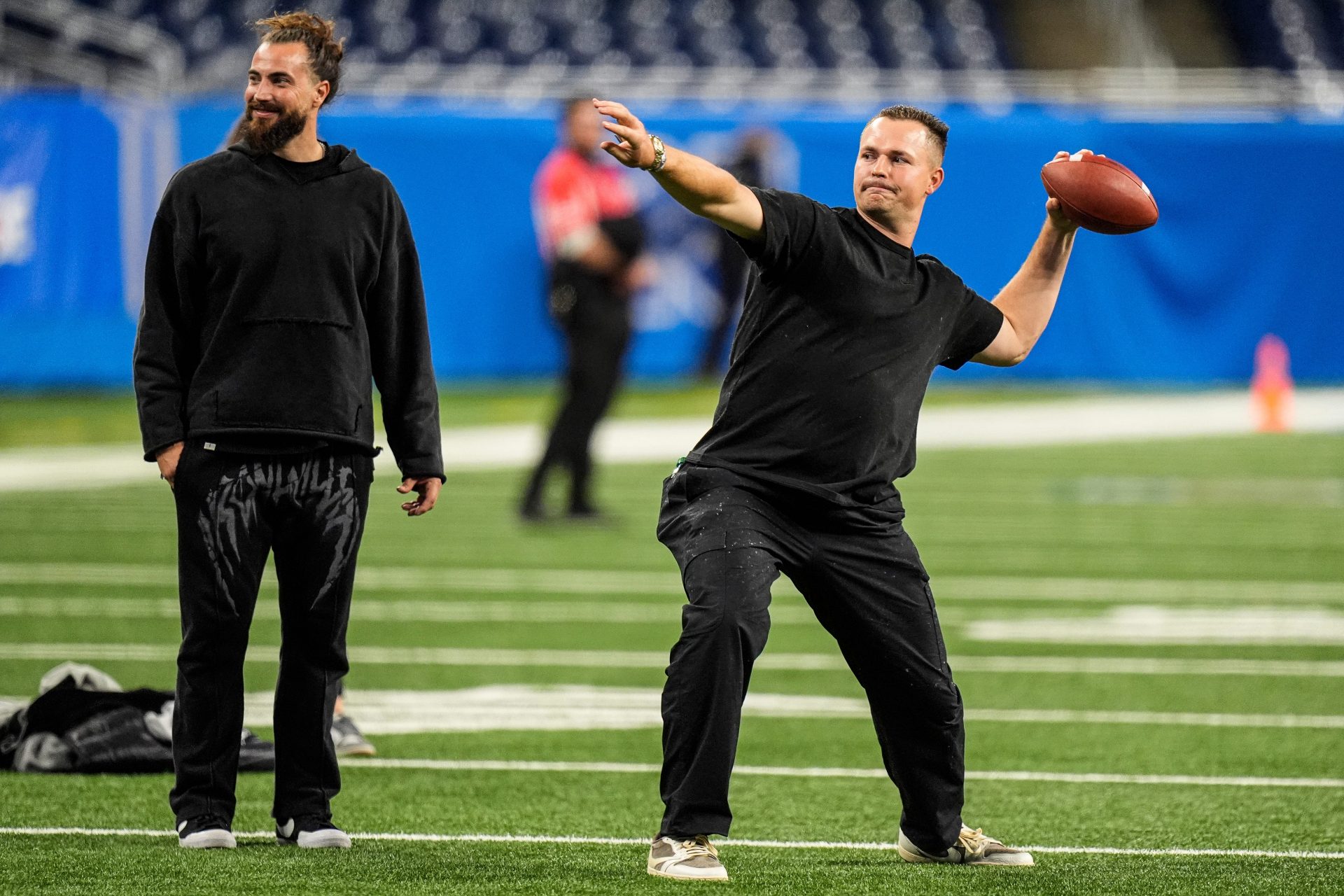 Detroit Tigers pitcher Tarik Skubal throws a football on the field after the Lions’ 29-24 loss to the Pittsburgh Steelers at Ford Field in Detroit on Sunday, Dec. 21, 2025. Credit: IMAGN