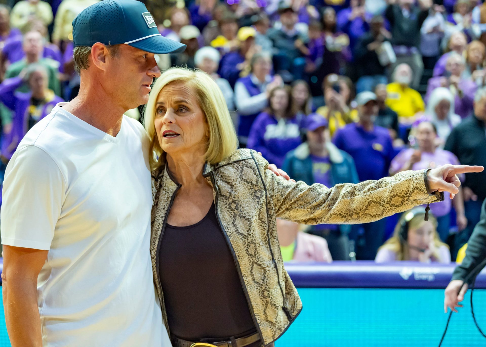 LSU Football Coach Lane Kiffin walks out with Tigers Basketball Coach Kim Mulkey, LSU Tigers Womens Basketball takes on the Kentucky Wildcats. Thursday, Jan. 1, 2026.