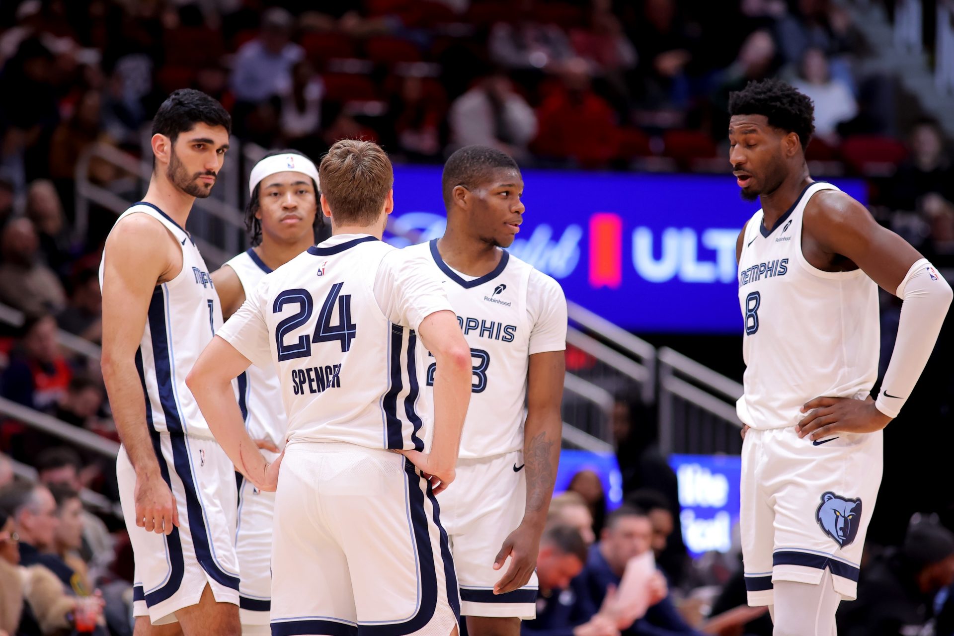 Memphis Grizzlies players huddle together during a timeout against the Houston Rockets during the first quarter at Toyota Center.