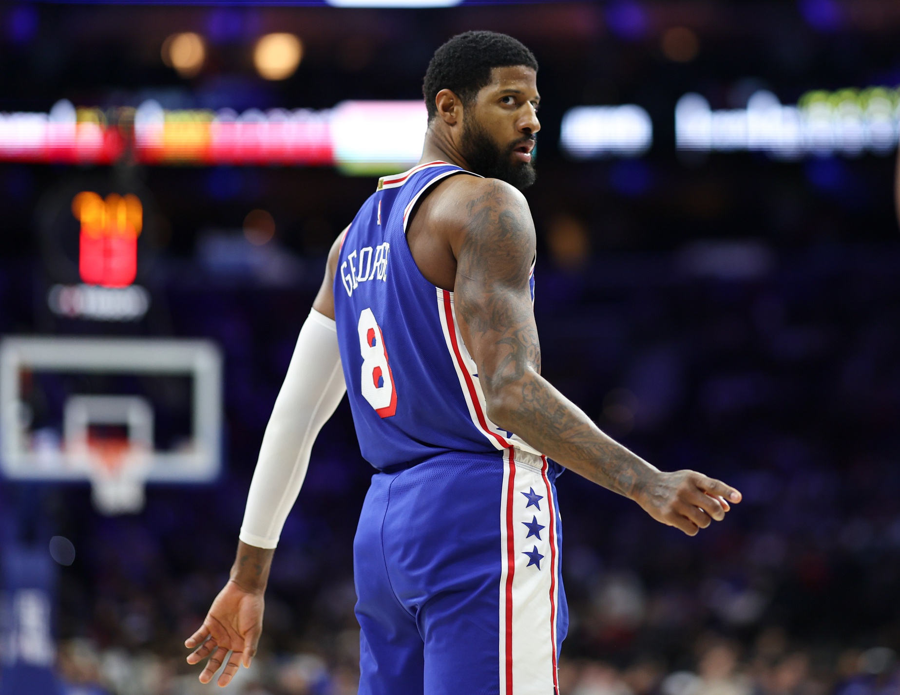 Philadelphia 76ers forward Paul George (8) reacts after his and one against the Cleveland Cavaliers during the second quarter at Xfinity Mobile Arena.