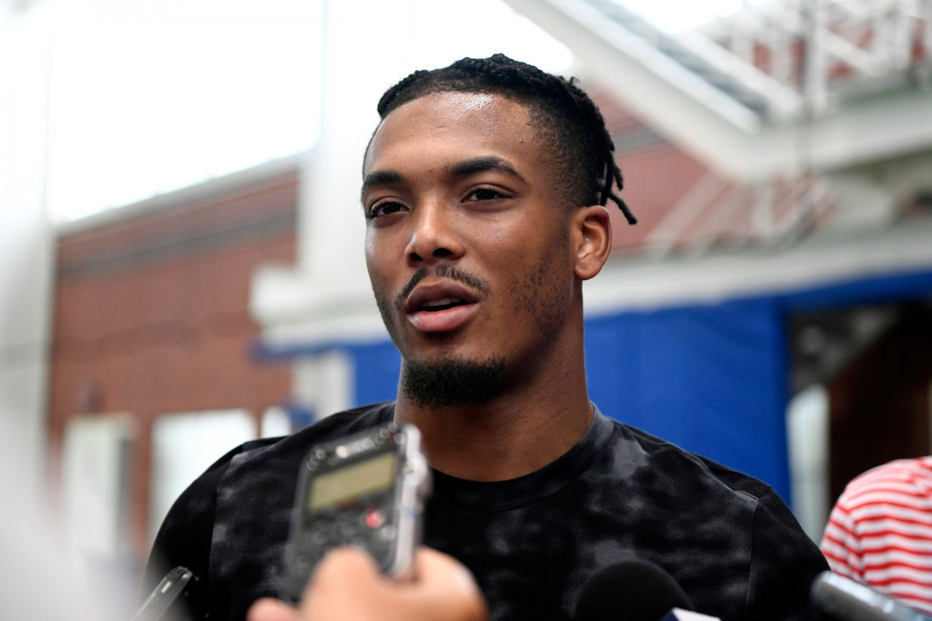 Ne York Giants cornerback Sam Beal talks to reporters after an offseason workout in 2019.