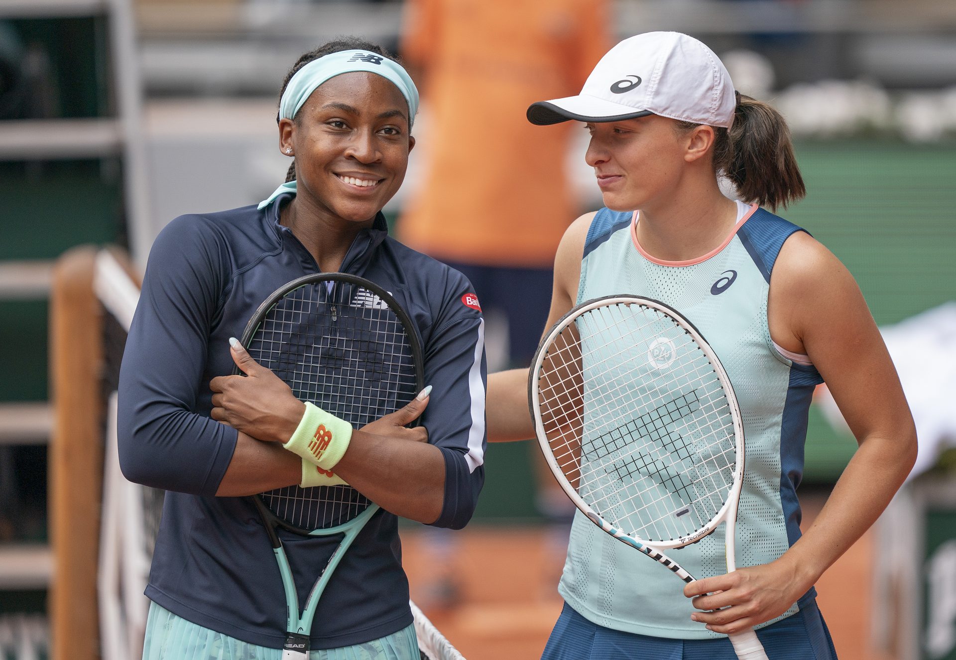 Iga Swiatek (POL) and Coco Gauff (USA) at the net before their womenÕs final match on day 14 of the French Open at Stade Roland-Garros.