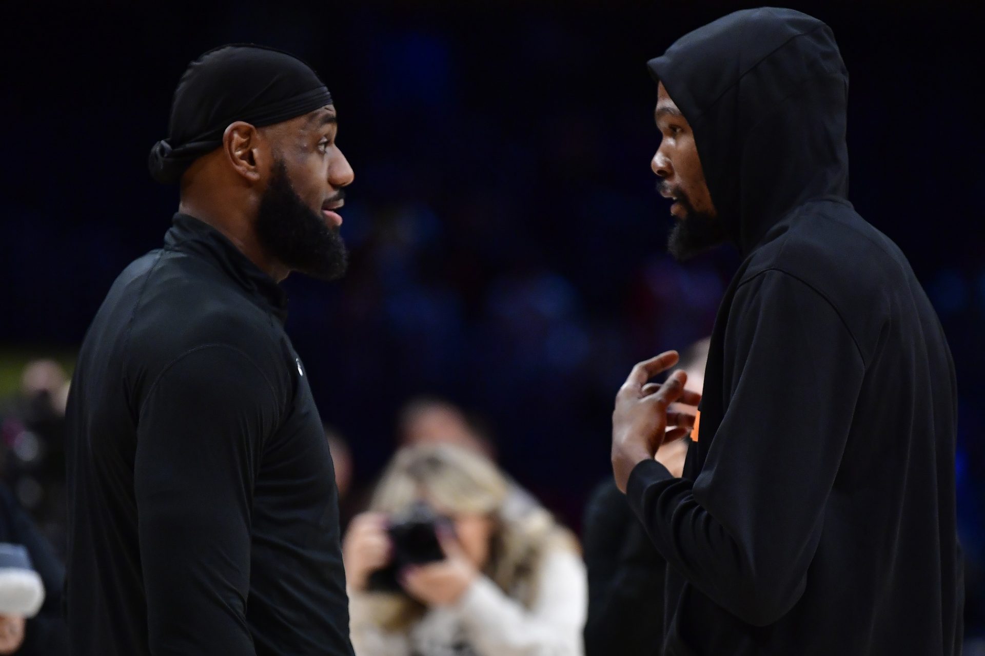 Phoenix Suns forward Kevin Durant (35) speaks with Los Angeles Lakers forward LeBron James (6) before the game at Crypto.com Arena.