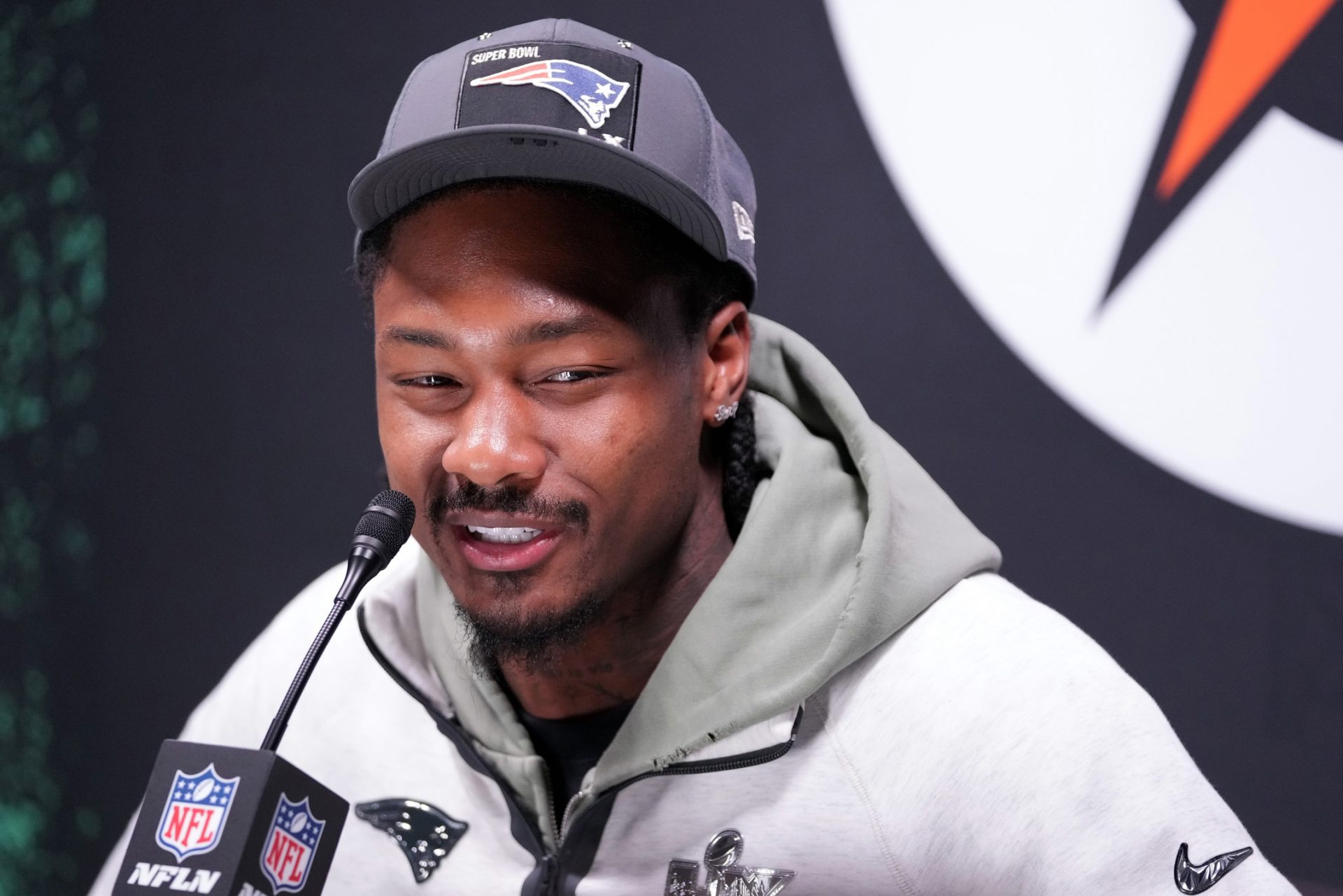 New England Patriots wide receiver Stefon Diggs (8) speaks to media during Opening Night for Super Bowl LX at San Jose Convention Center.