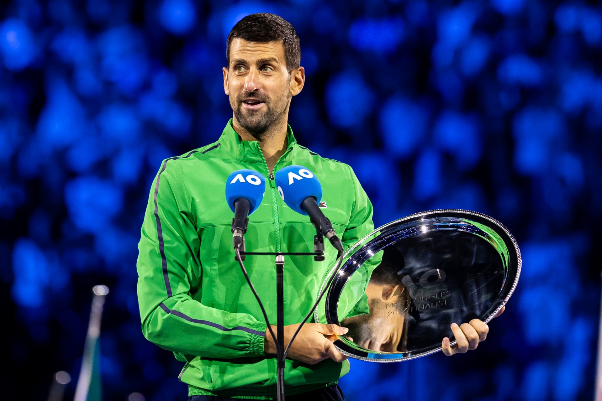 Novak Djokovic of Serbia with his finalist trophy after the final of the mens singles against Carlos Alcaraz of Spain at the Australian Open at Rod Laver Arena in Melbourne Park.