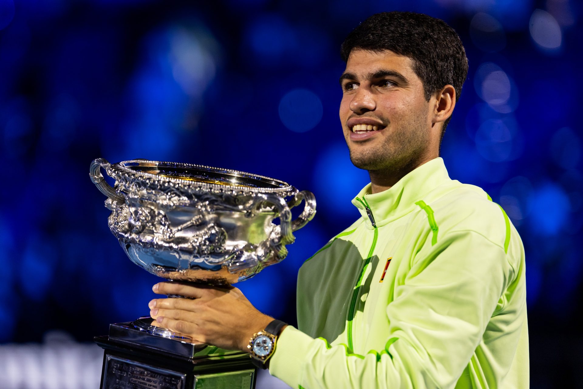 Carlos Alcaraz of Spain with the Norman Brookes Challenge Cup after his victory over Novak Djokovic of Serbia in the final of the mens singles at the Australian Open at Rod Laver Arena in Melbourne Park.