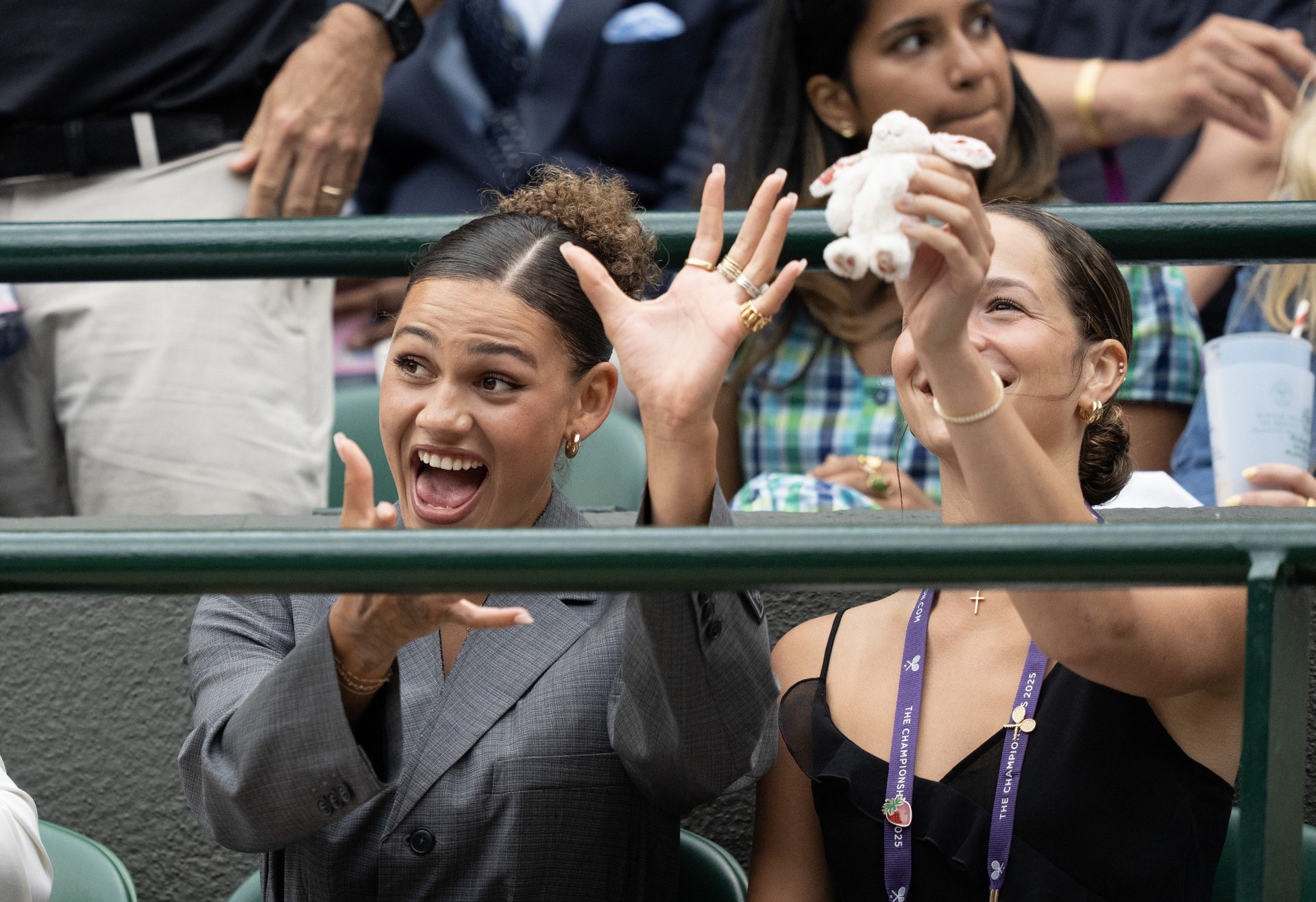 Trinity Rodman and Emma Shelton  in attendance for the Ben Shelton of the United States and Marton Fucsovics of Hungary (both not pictured) match  on day six at the All England Lawn Tennis and Croquet Club.