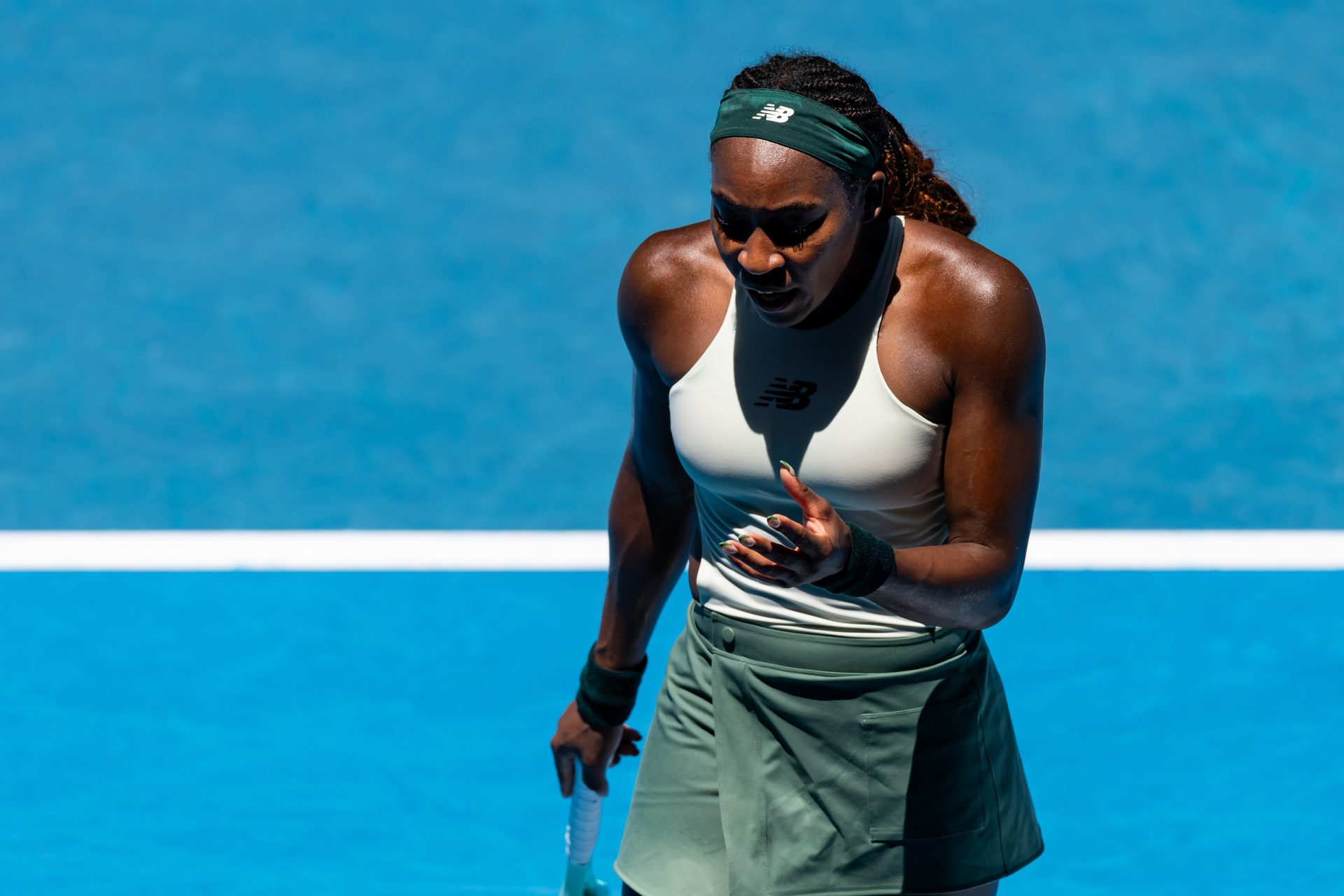Coco Gauff of United States of America gestures during her match against Paula Badosa of Spain in the quarterfinals of the women's singles at the 2025 Australian Open at Melbourne Park.
