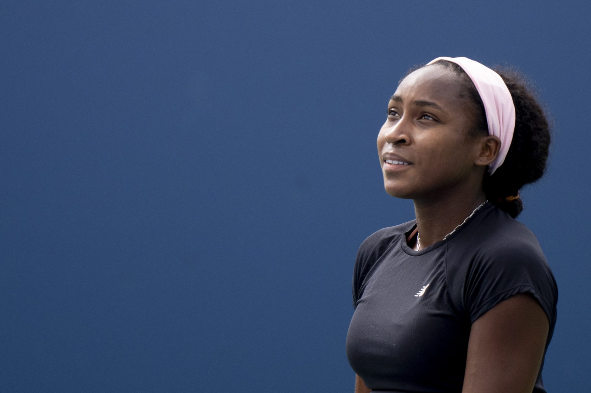 Coco Gauff, of the United States, smiles while practicing during the Western & Southern Open at Lindner Family Tennis Center.