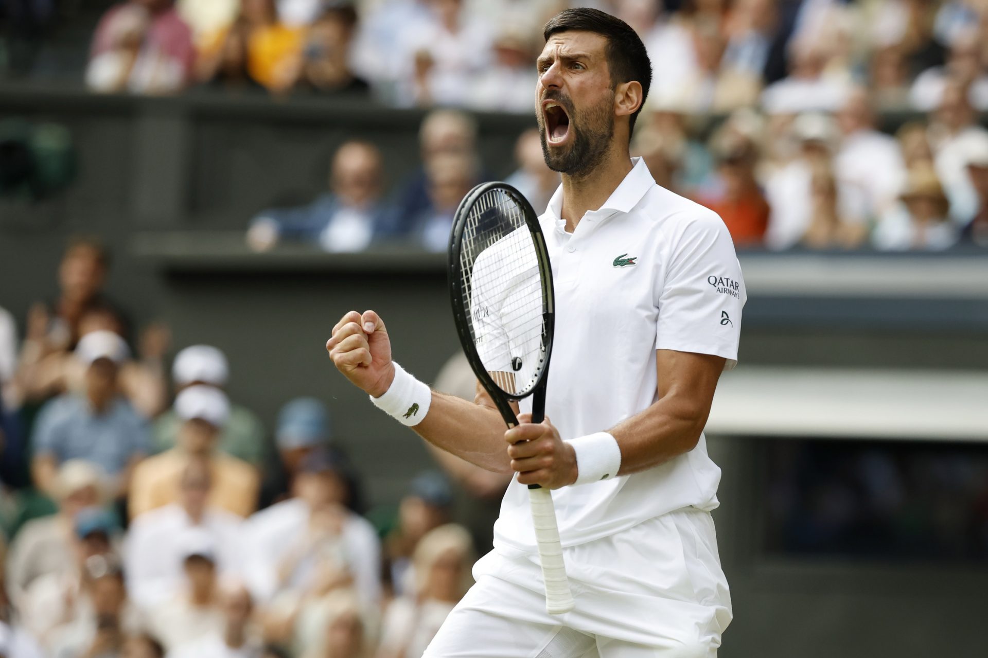Novak Djokovic (SRB) reacts after winning the second set against Alex de Minaur (AUS)(not pictured) on day eight of The Championships Wimbledon 2025 at All England Lawn Tennis and Croquet Club.