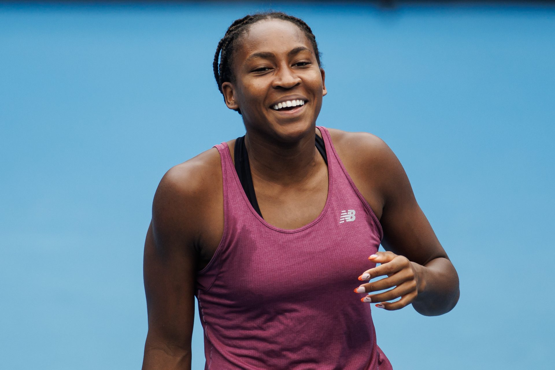 Coco Gauff of the United States laughs during a practice session on Kia Arena at Melbourne Park.