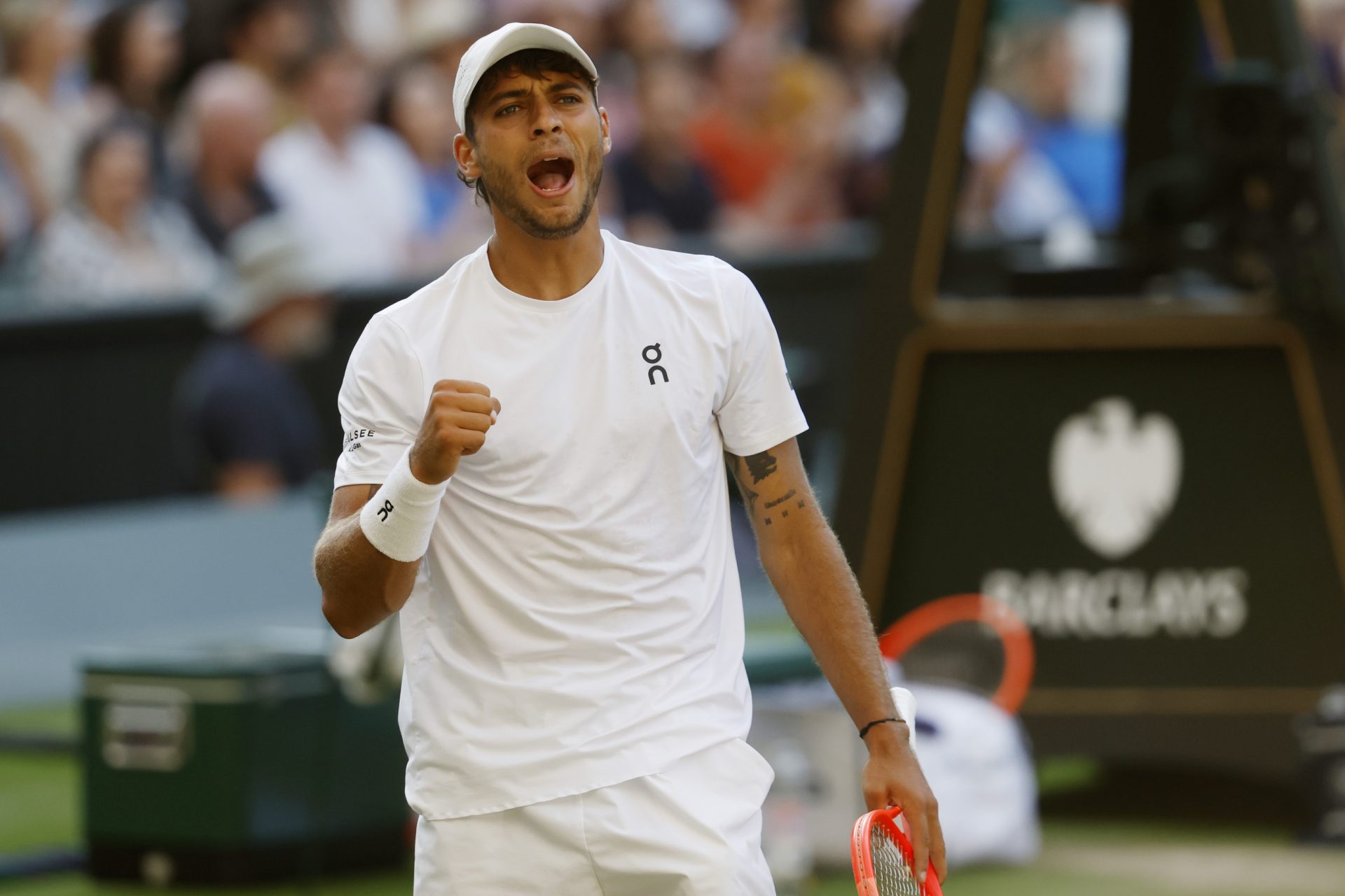 Flavio Cobolli (ITA) reacts after winning a point against Novak Djokovic (SRB)(not pictured) in a gentlemen's singles quarter-final on day ten of these Championships Wimbledon 2025 at All England Lawn Tennis and Croquet Club.