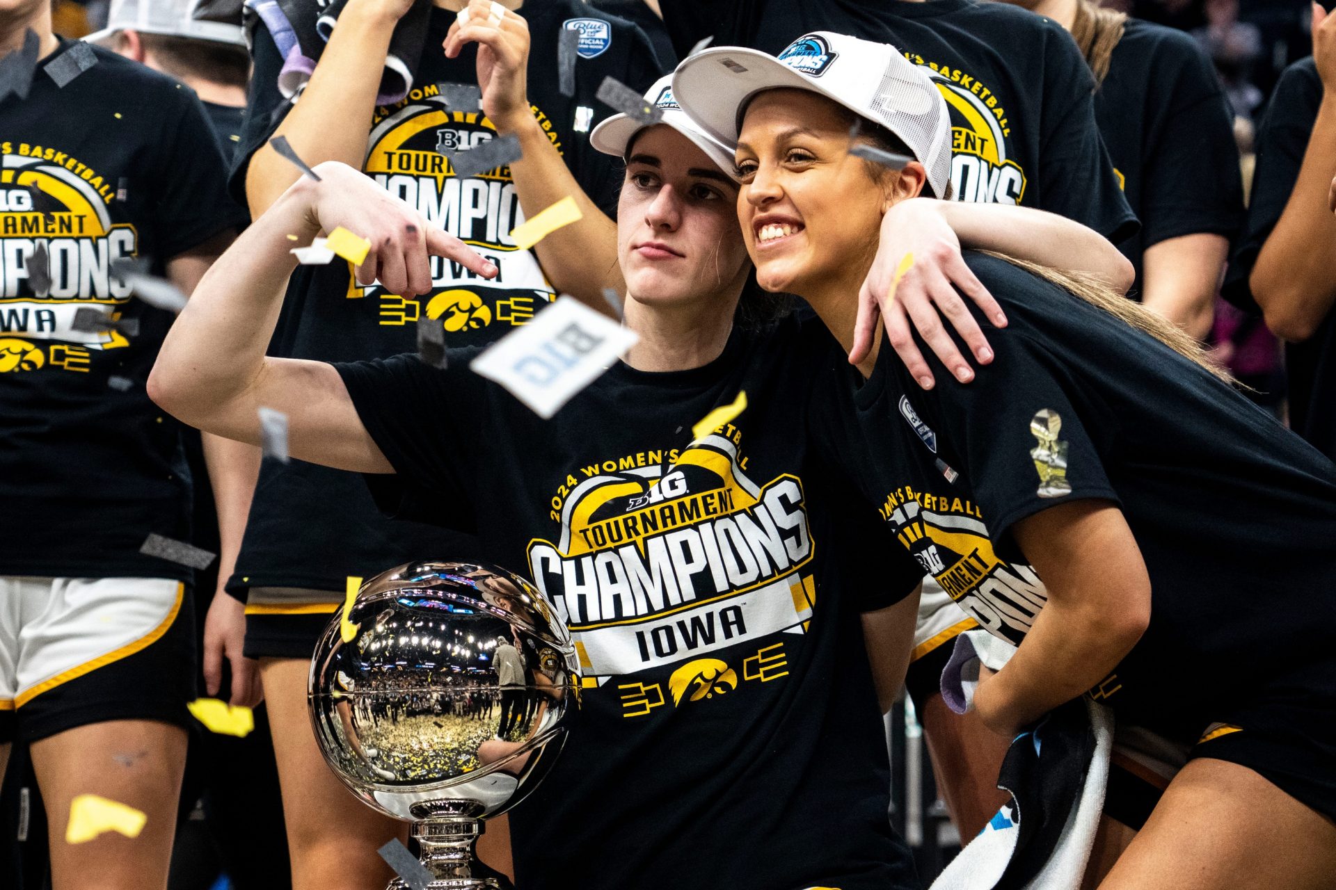Iowa guard Caitlin Clark (22) and Iowa guard Gabbie Marshall (24) pose for a photo after the Big Ten Tournament championship game at the Target Center on Sunday, March 10, 2024, in Minneapolis, Minn.