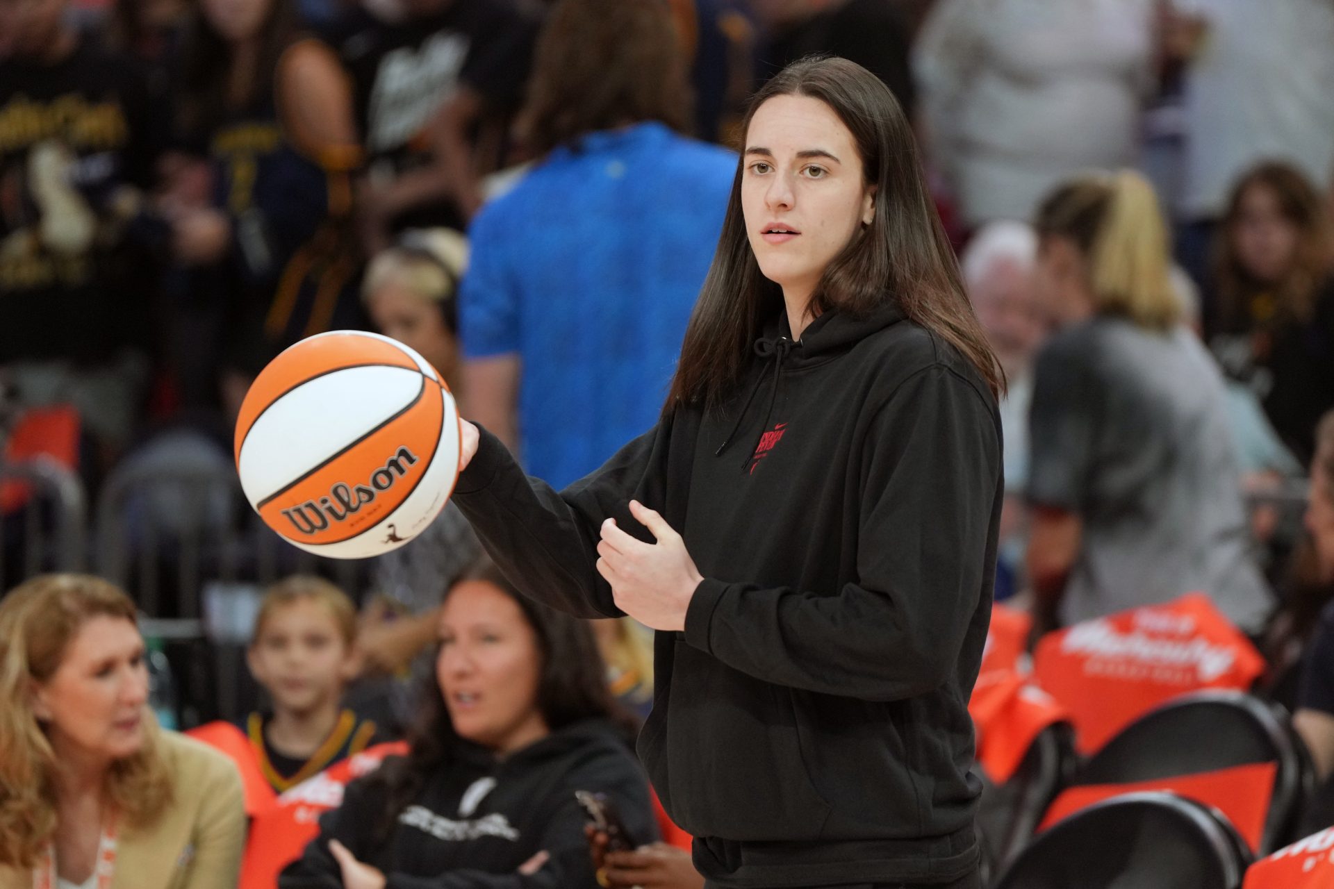 Indiana Fever guard Caitlin Clark (22) walks out on to the floor before a game against the Phoenix Mercury at PHX Arena.