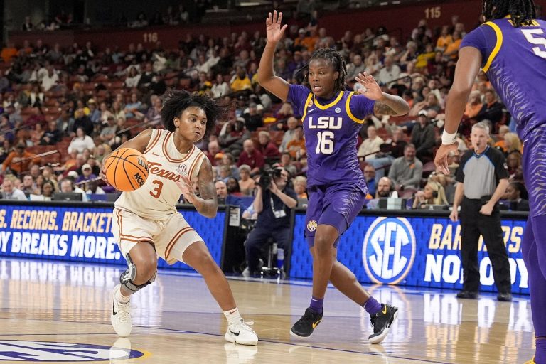 Texas Longhorns guard Rori Harmon (3) handles the ball at the top of the key defended but LSU Lady Tigers guard Kailyn Gilbert (16) during the second half at Bon Secours Wellness Arena - Source: Imagn