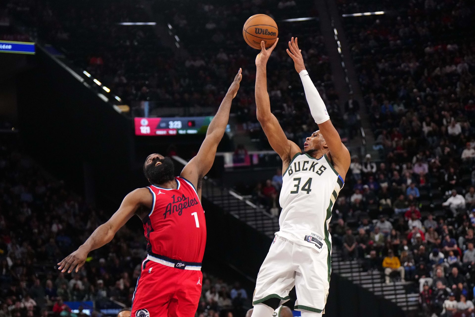 Milwaukee Bucks forward Giannis Antetokounmpo (34) shoots the ball against LA Clippers guard James Harden (1) in the second half at Intuit Dome.
