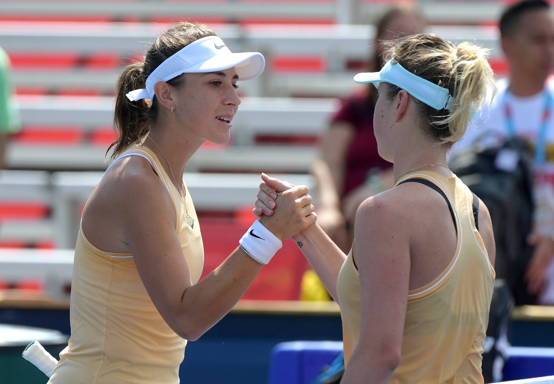 Elina Svitolina (Ukraine, right) shakes hands after defeating Belinda Bencic (Switzerland) during the Rogers Cup tennis tournament at Aviva Centre.