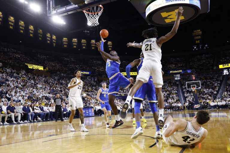 UCLA Bruins guard Eric Dailey Jr. (3) shoots in the second half against the Michigan Wolverines at Crisler Center.