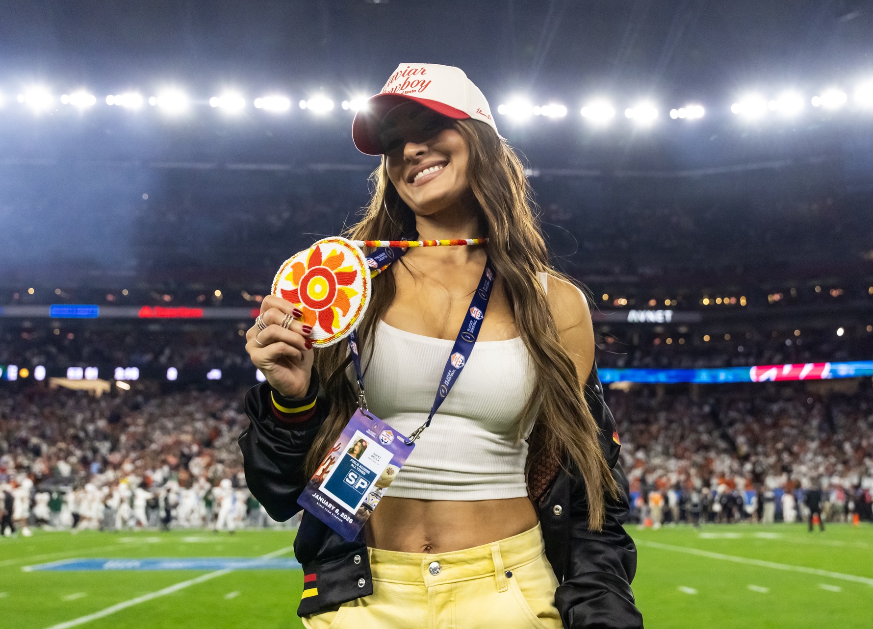 WWE Hall of Fame wrestler Nikki Bella in attendance of the Miami Hurricanes game against the Mississippi Rebels during the 2026 Fiesta Bowl and semifinal game of the College Football Playoff at State Farm Stadium.