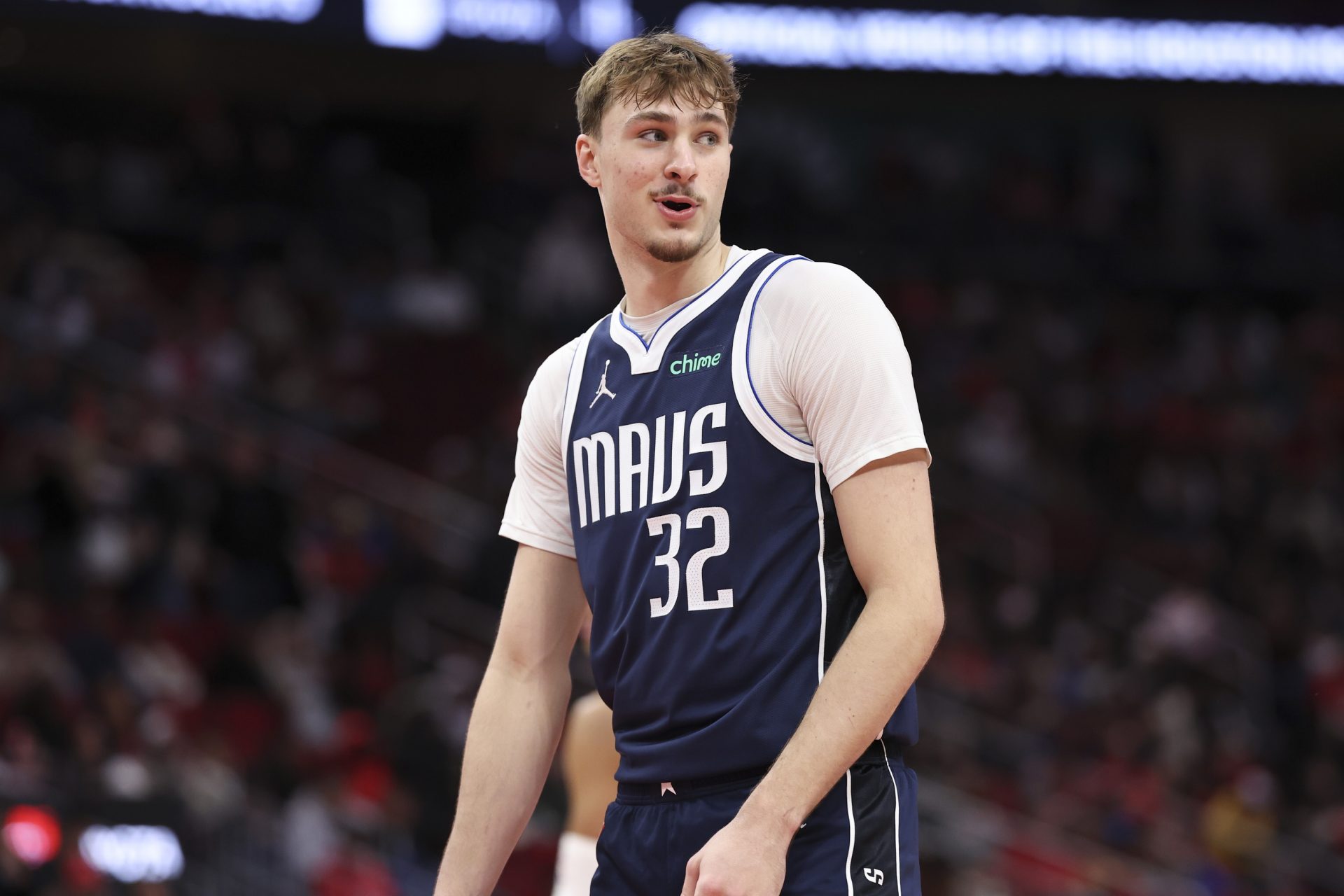 Dallas Mavericks forward Cooper Flagg (32) smiles after a play during the third quarter against the Houston Rockets at Toyota Center.