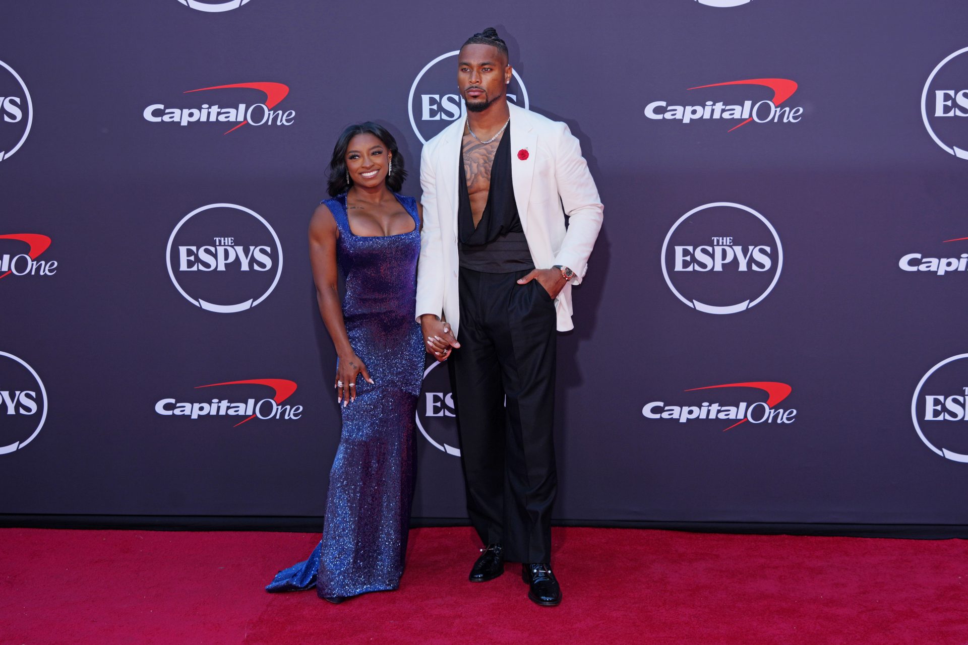 Simone Biles and Jonathan Owens on the red carpet before the ESPYS at The Dolby Theatre.