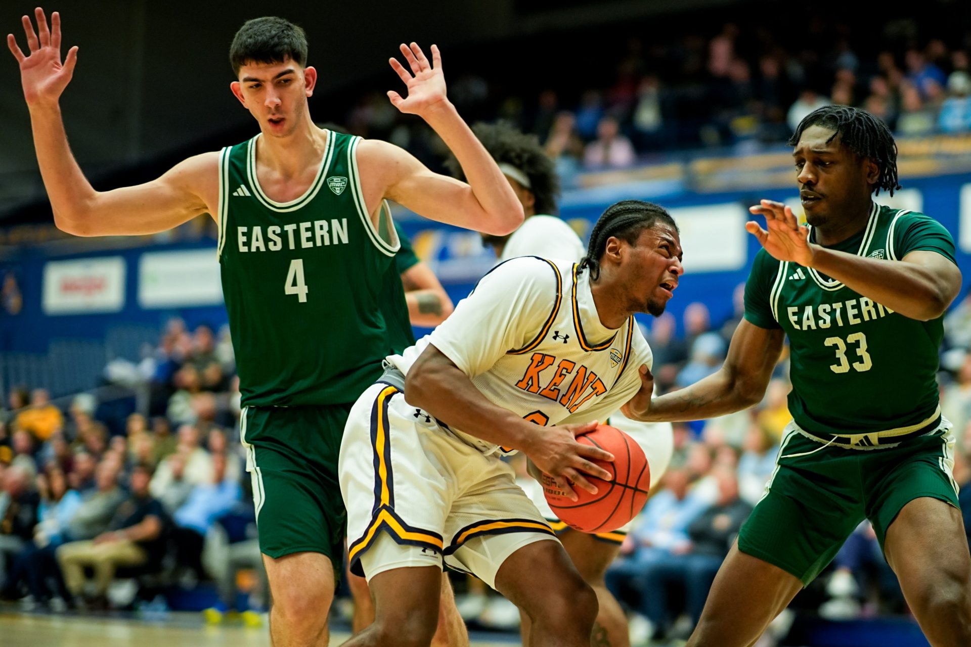 Kent State University’s Morgan Safford (8) looks to shoot while guarded by Eastern Michigan University’s Mohammad Habhab (4) and Eastern Michigan University’s John Shanu II (33), Feb. 11, 2026, at M.A.C. Center in Kent, Ohio. Credit: IMAGN