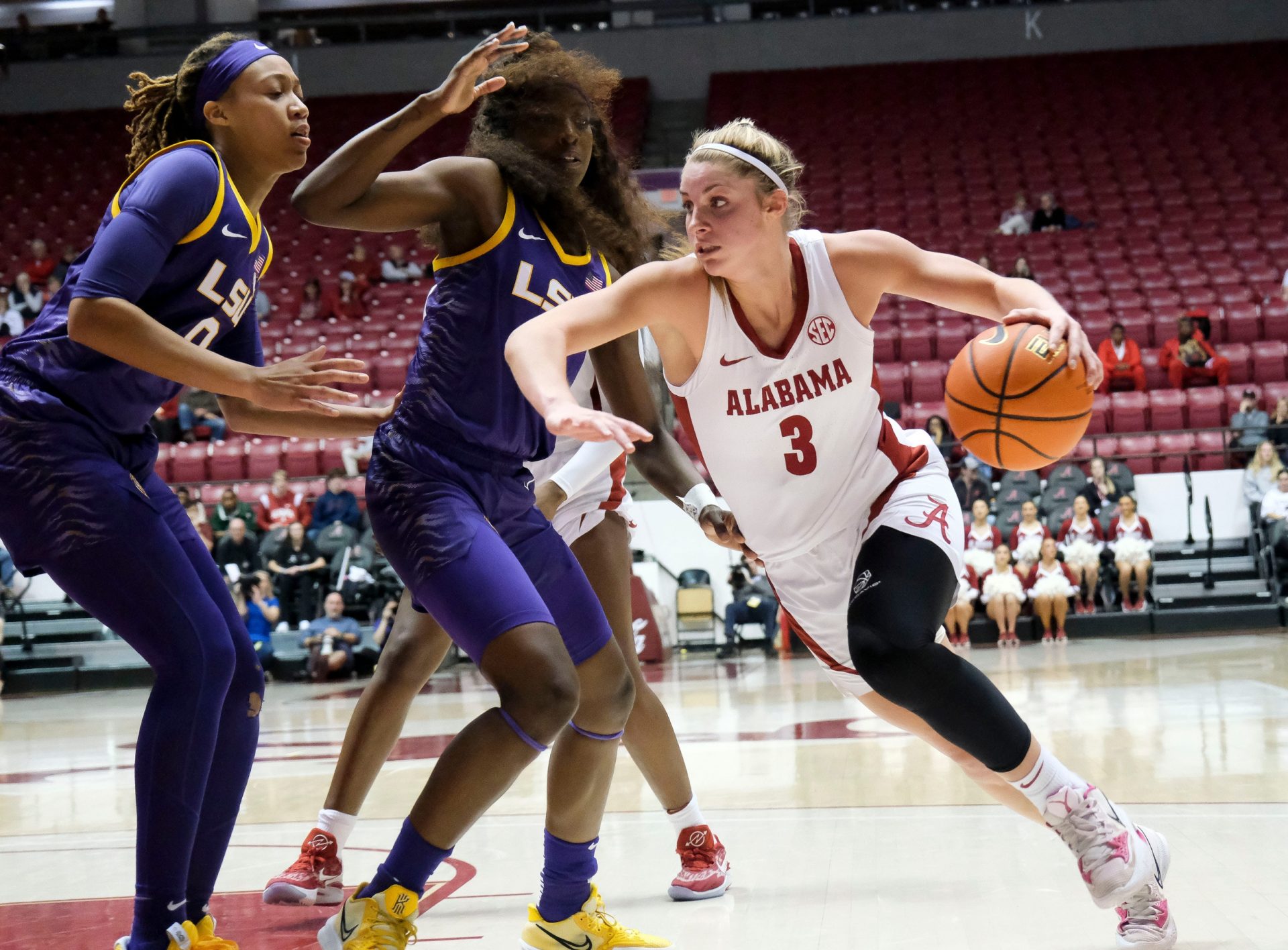 Alabama guard Sarah Ashlee Barker (3) drives the ball along the baseline with LSU forward LaDazhia Williams (0) defending in Coleman Coliseum Monday night.

Ncaa Basketball Alabama Women Vs Lsu