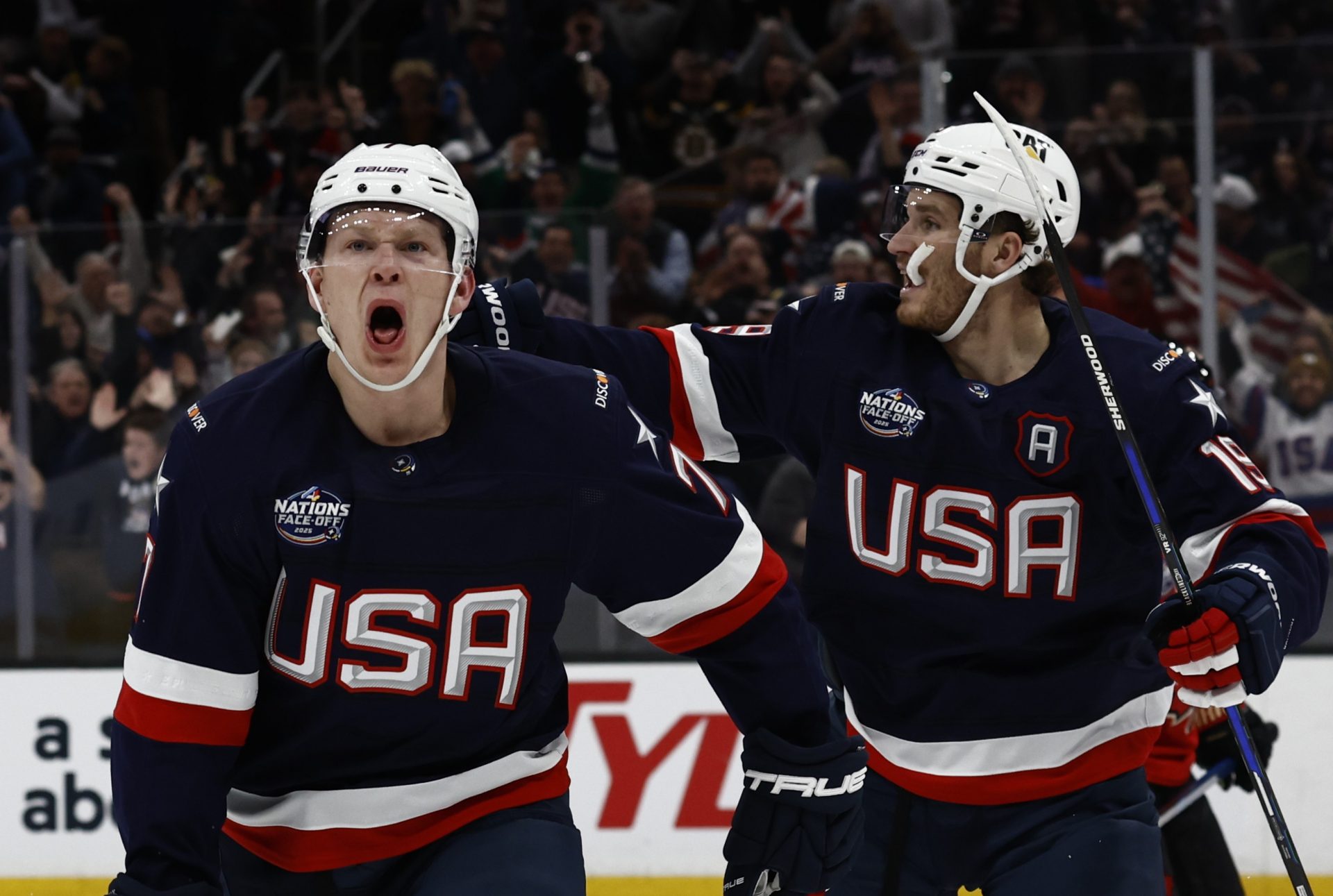 Team USA forward Brady Tkachuk (7) celebrates scoring against Team Canada during the first period during the 4 Nations Face-Off ice hockey championship game at TD Garden.