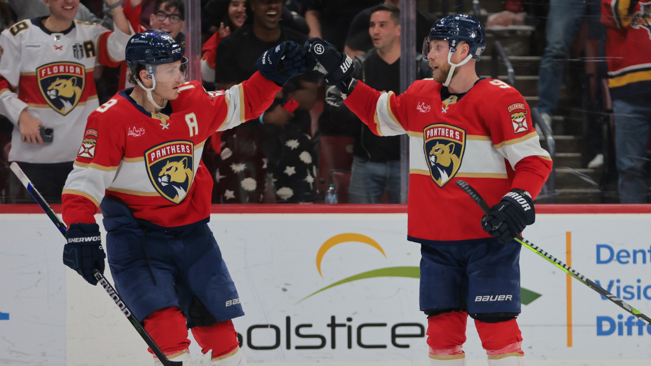 Florida Panthers center Sam Bennett (9) celebrates with left wing Matthew Tkachuk (19) after scoring against the Ottawa Senators during the second period at Amerant Bank Arena.